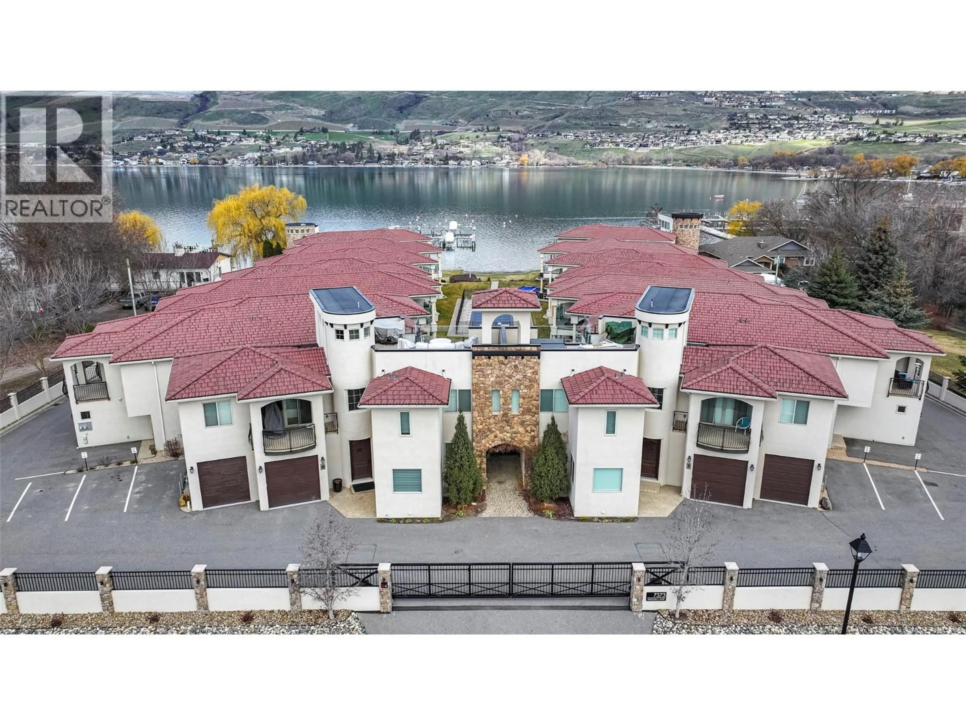 A pic from outside/outdoor area/front of a property/back of a property/a pic from drone, water/lake/river/ocean view for 4 - 7373 BROOKS LANE, Vernon British Columbia V1H1G6