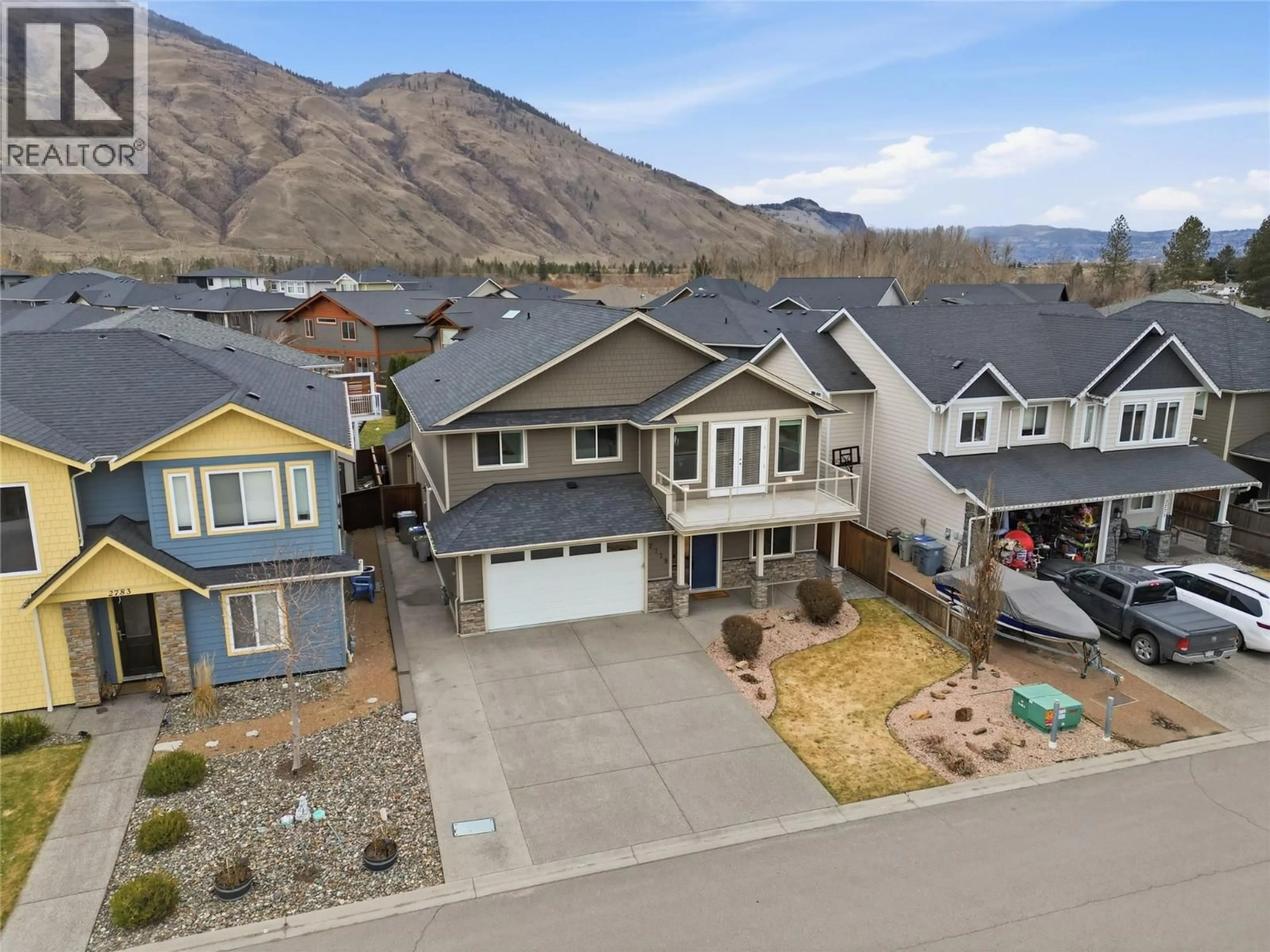 A pic from outside/outdoor area/front of a property/back of a property/a pic from drone, mountain view for 2779 BEACHMOUNT CRESCENT, Kamloops British Columbia V2B0E6
