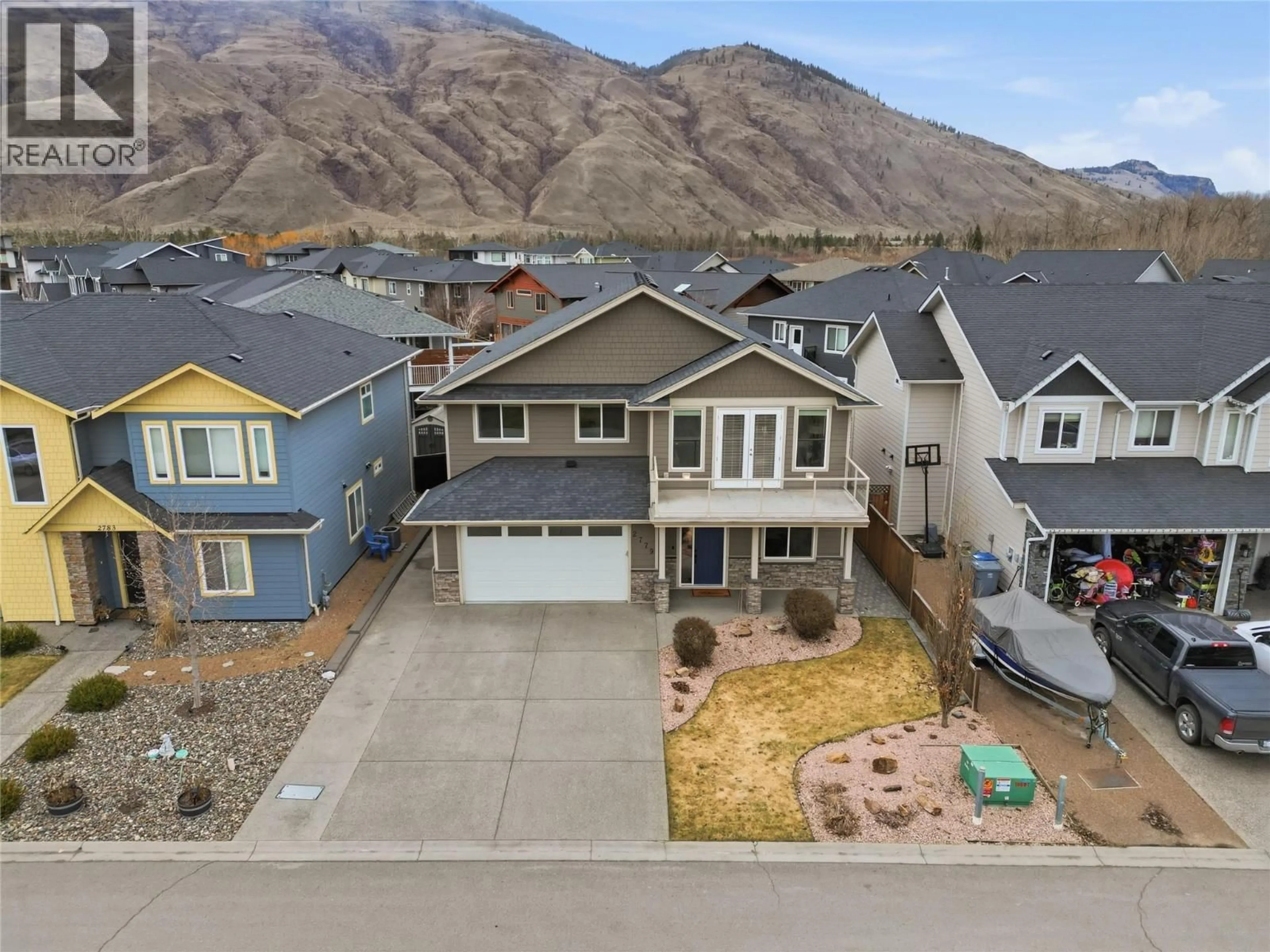 A pic from outside/outdoor area/front of a property/back of a property/a pic from drone, mountain view for 2779 BEACHMOUNT CRESCENT, Kamloops British Columbia V2B0E6
