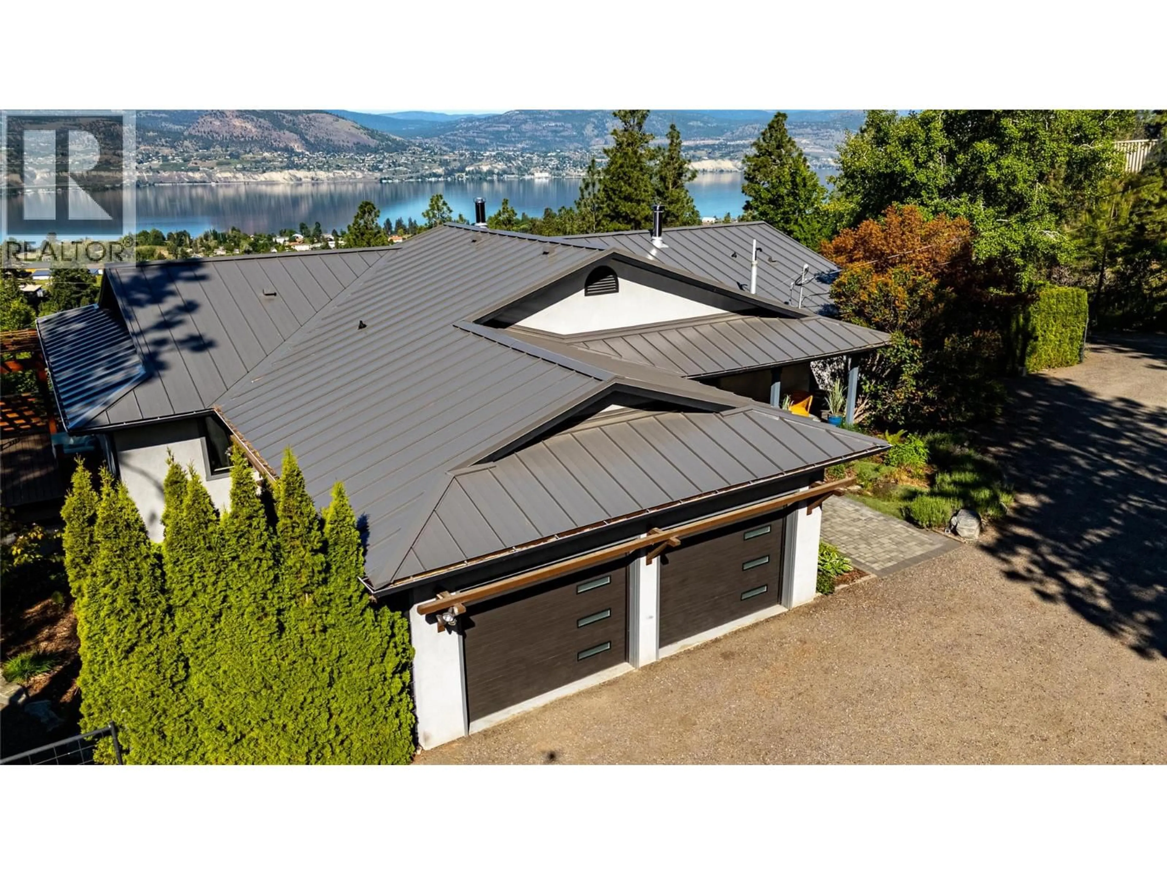 A pic from outside/outdoor area/front of a property/back of a property/a pic from drone, unknown for 1306 SMETHURST ROAD, Naramata British Columbia V0H1N1