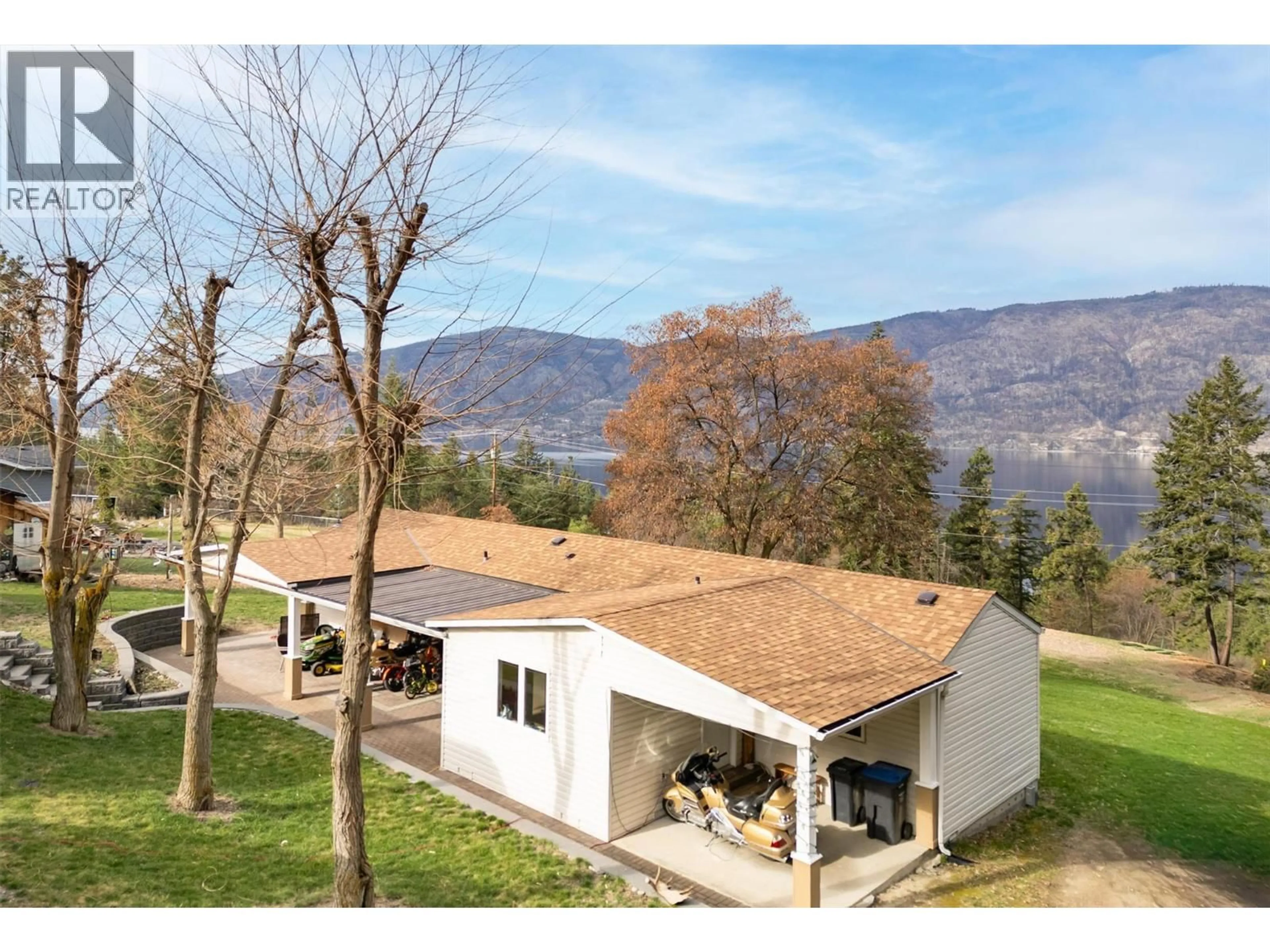 A pic from outside/outdoor area/front of a property/back of a property/a pic from drone, mountain view for 5574 STUBBS ROAD, Lake Country British Columbia V4V1N1