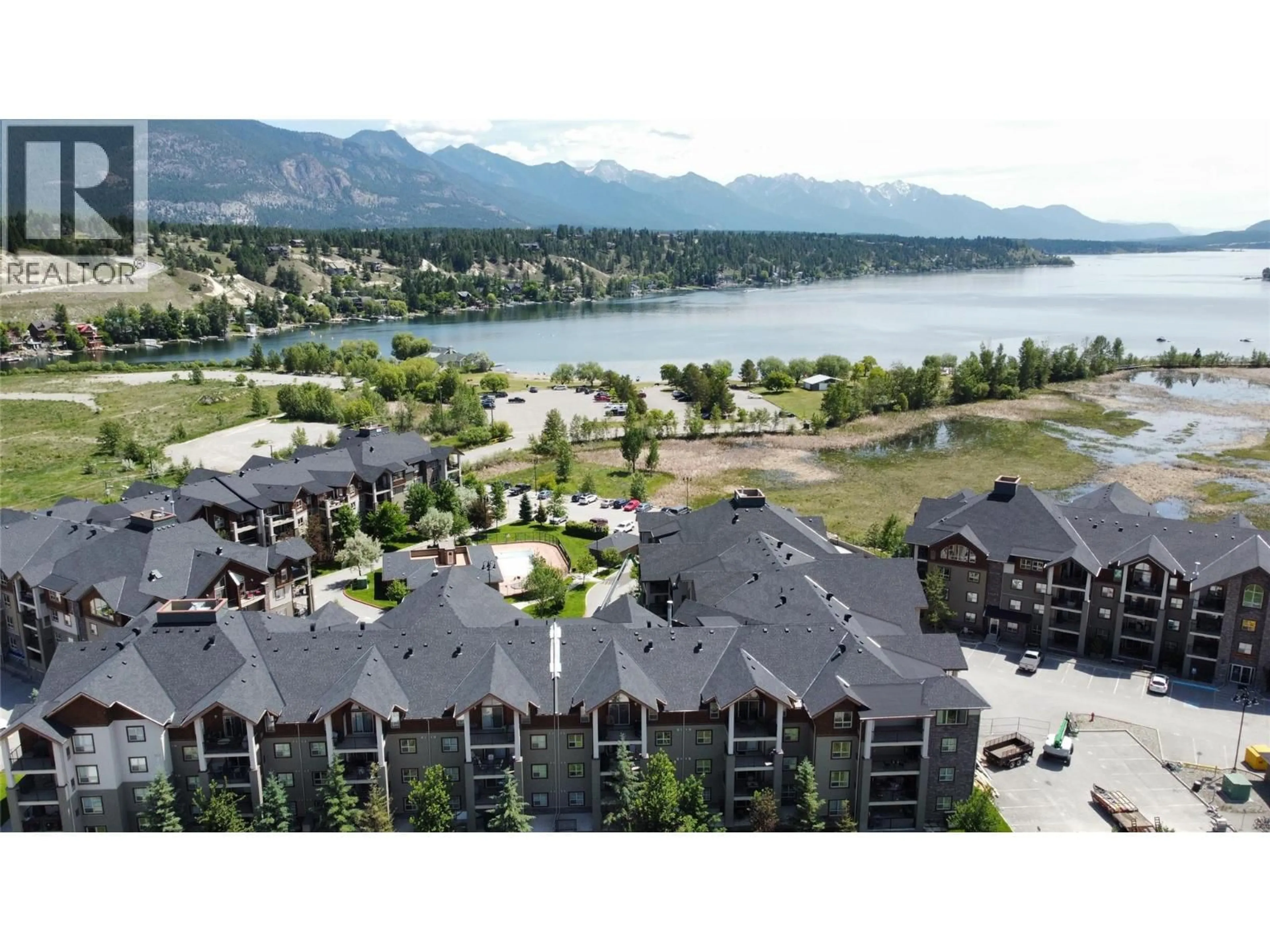 A pic from outside/outdoor area/front of a property/back of a property/a pic from drone, water/lake/river/ocean view for 2212 - 205 THIRD AVENUE, Invermere British Columbia V0A1K7