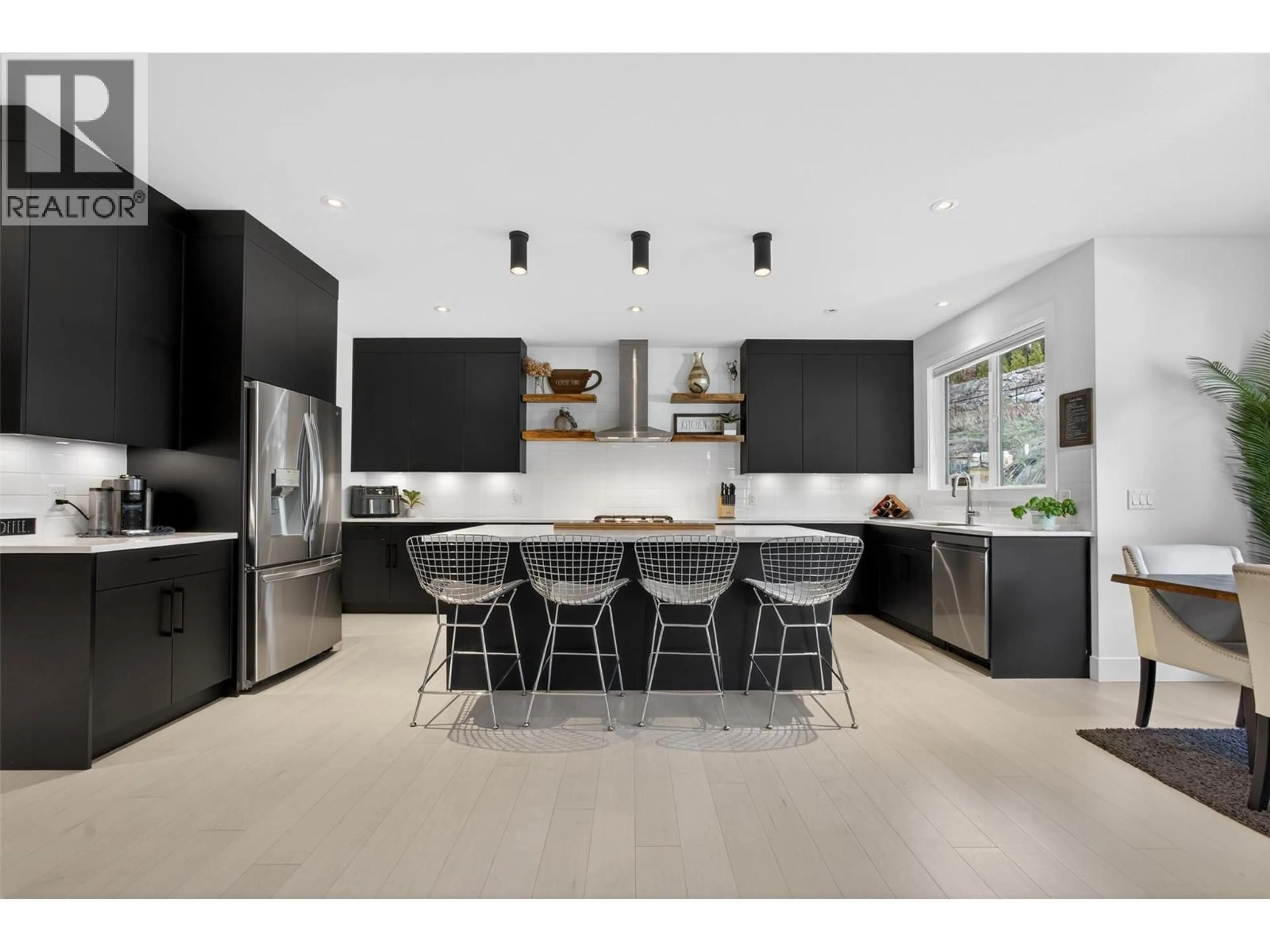 Contemporary kitchen, ceramic/tile floor for 2008 BEGBIE ROAD, Kelowna British Columbia V1V2X3