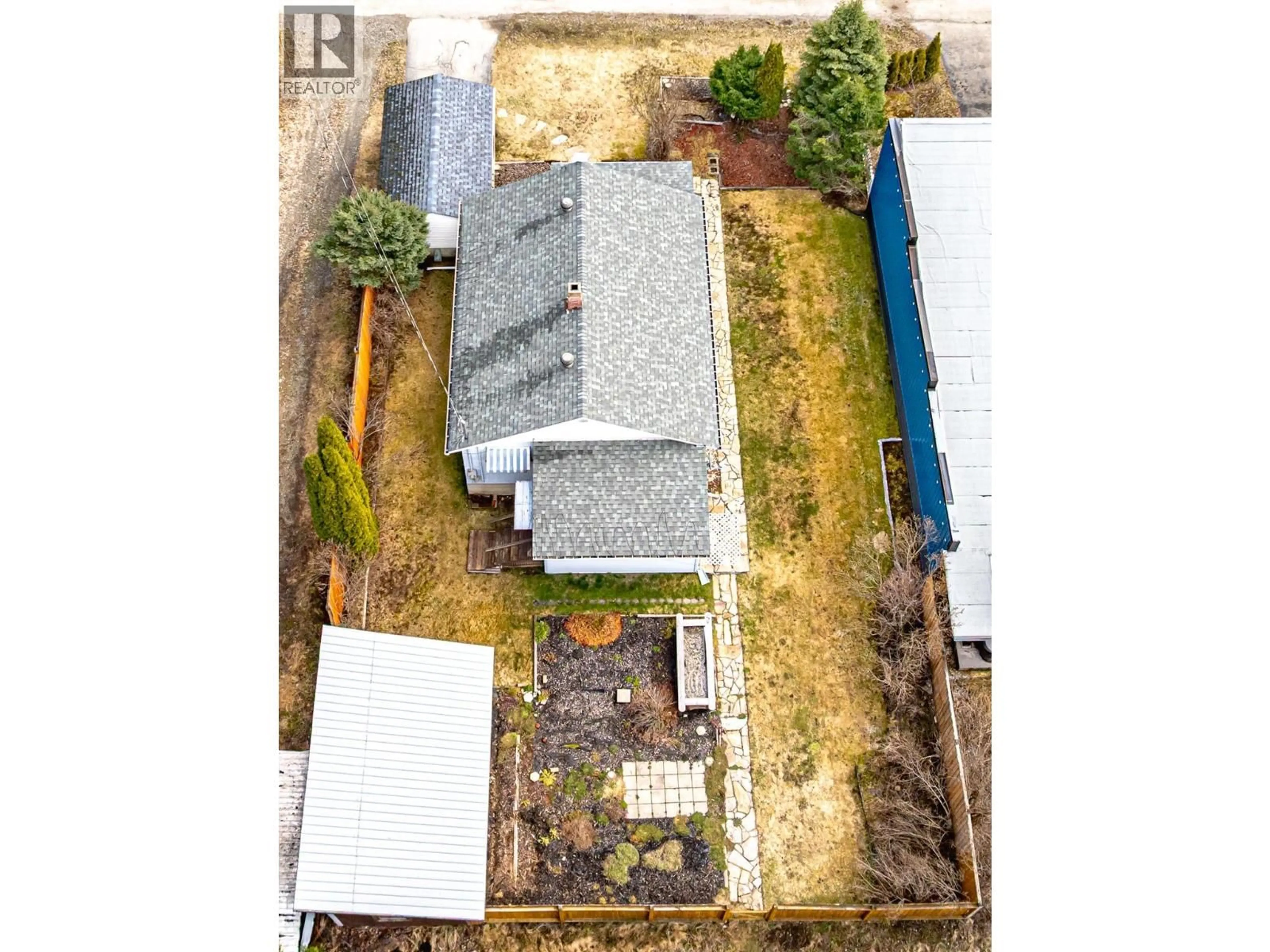 A pic from outside/outdoor area/front of a property/back of a property/a pic from drone, building for 6910 1ST AVENUE, Ymir British Columbia V0G2K0