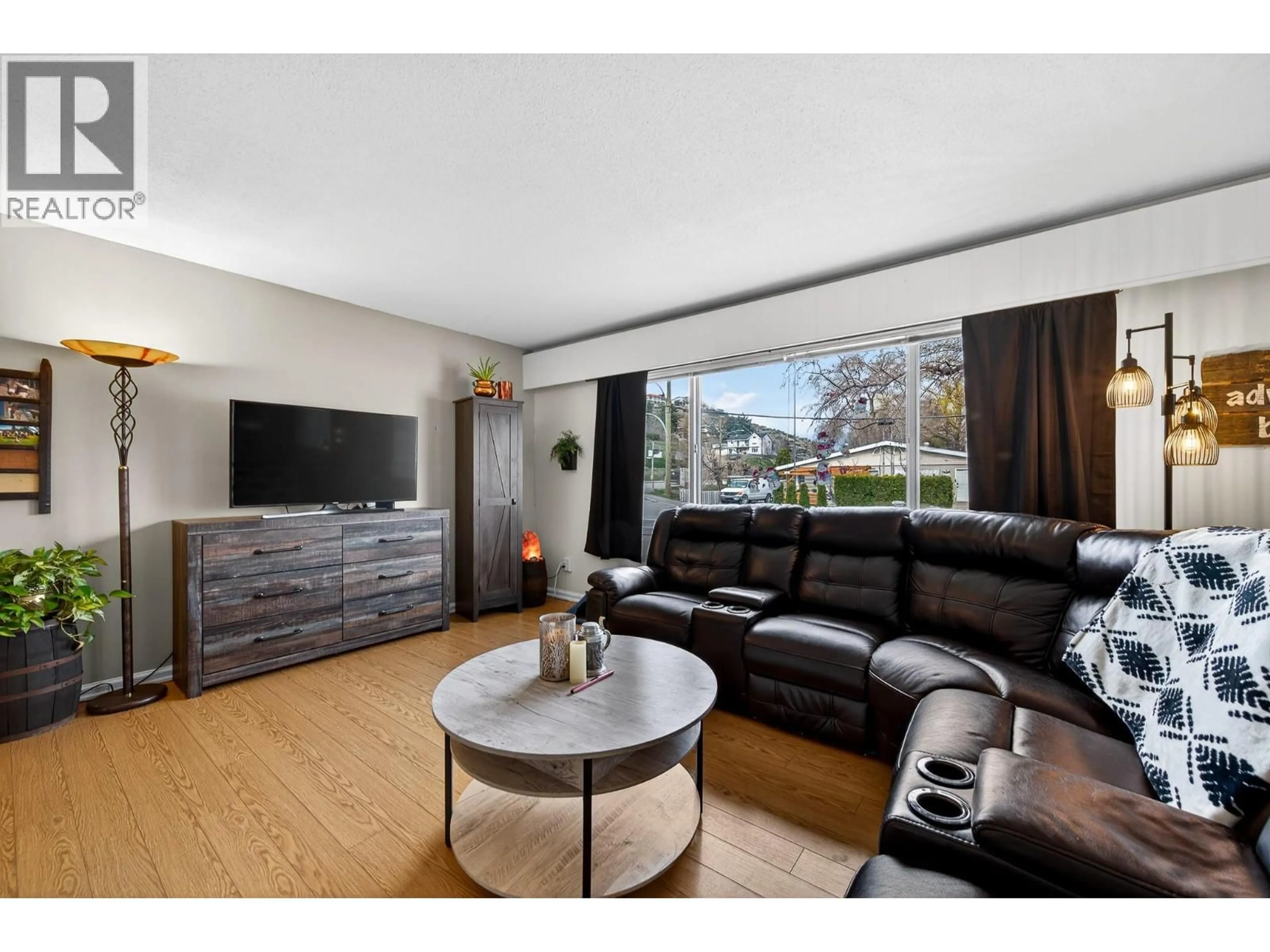 Living room with furniture, wood/laminate floor for 1669 WESTMOUNT DRIVE, Kamloops British Columbia V2B6A4