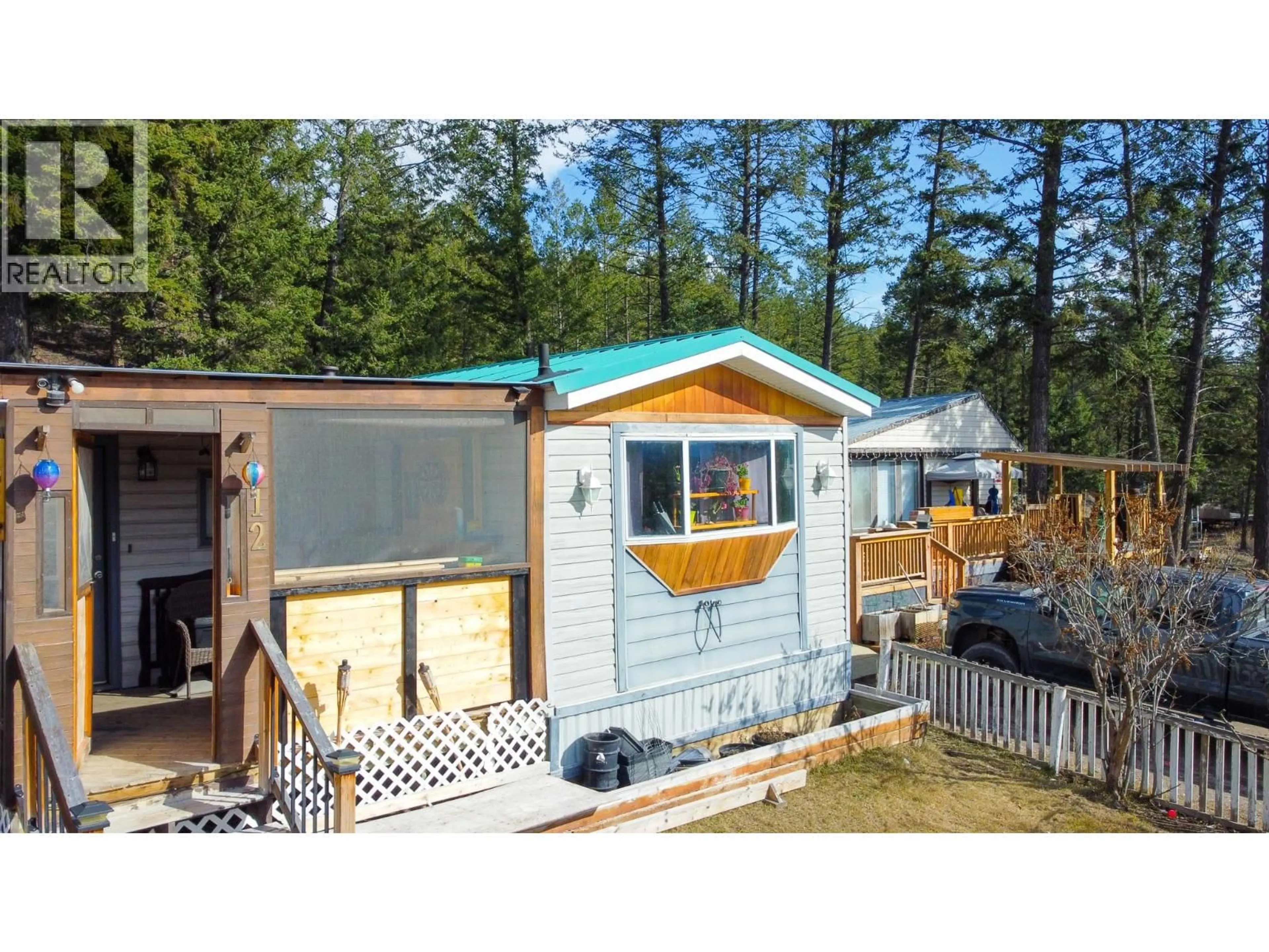 Home with vinyl exterior material, street for 12 EACRETT ROAD, Radium Hot Springs British Columbia V0A1M0