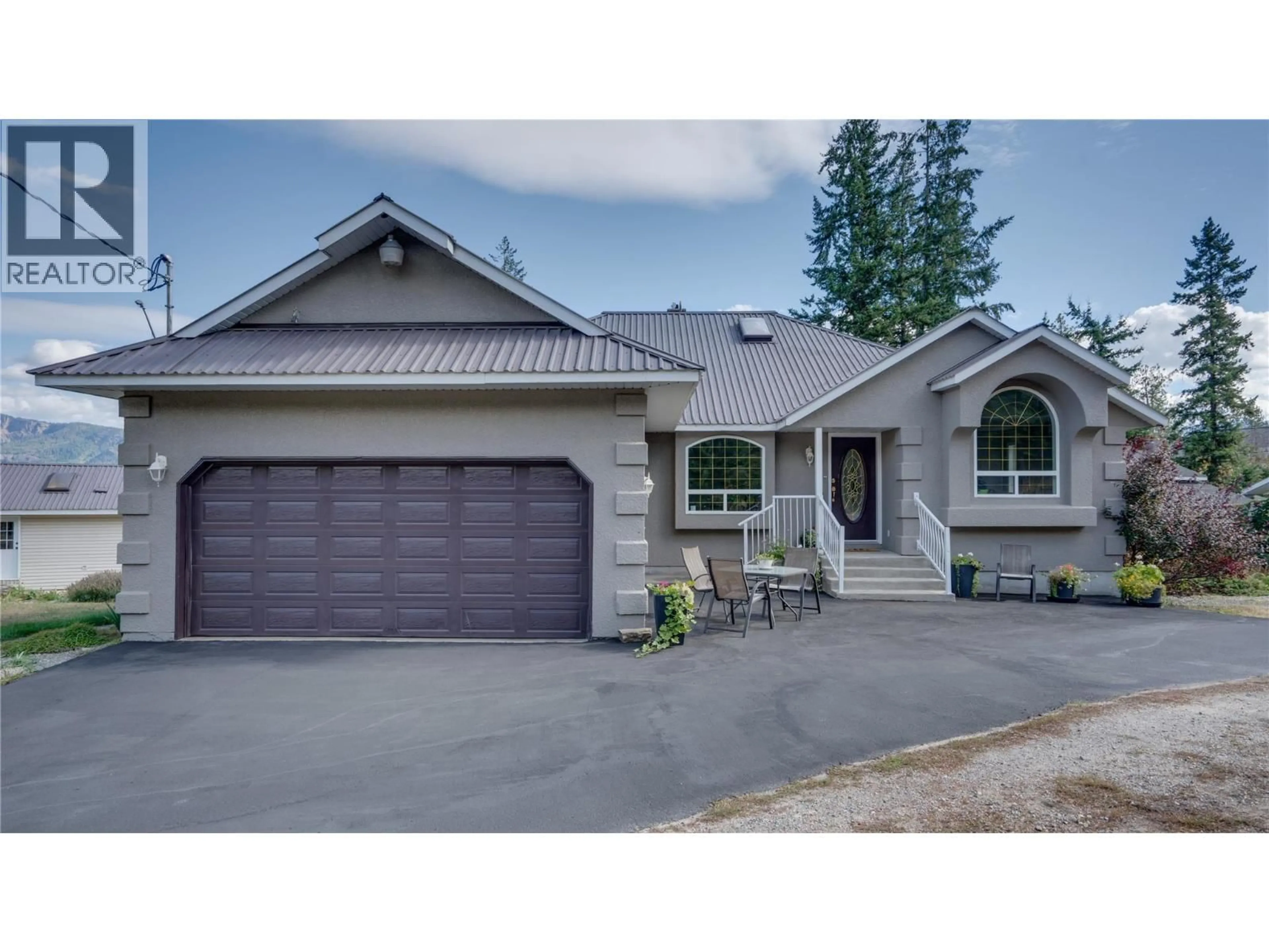 Home with vinyl exterior material, street for 353 GUNTER-ELLISON ROAD, Enderby British Columbia V4Y4G2