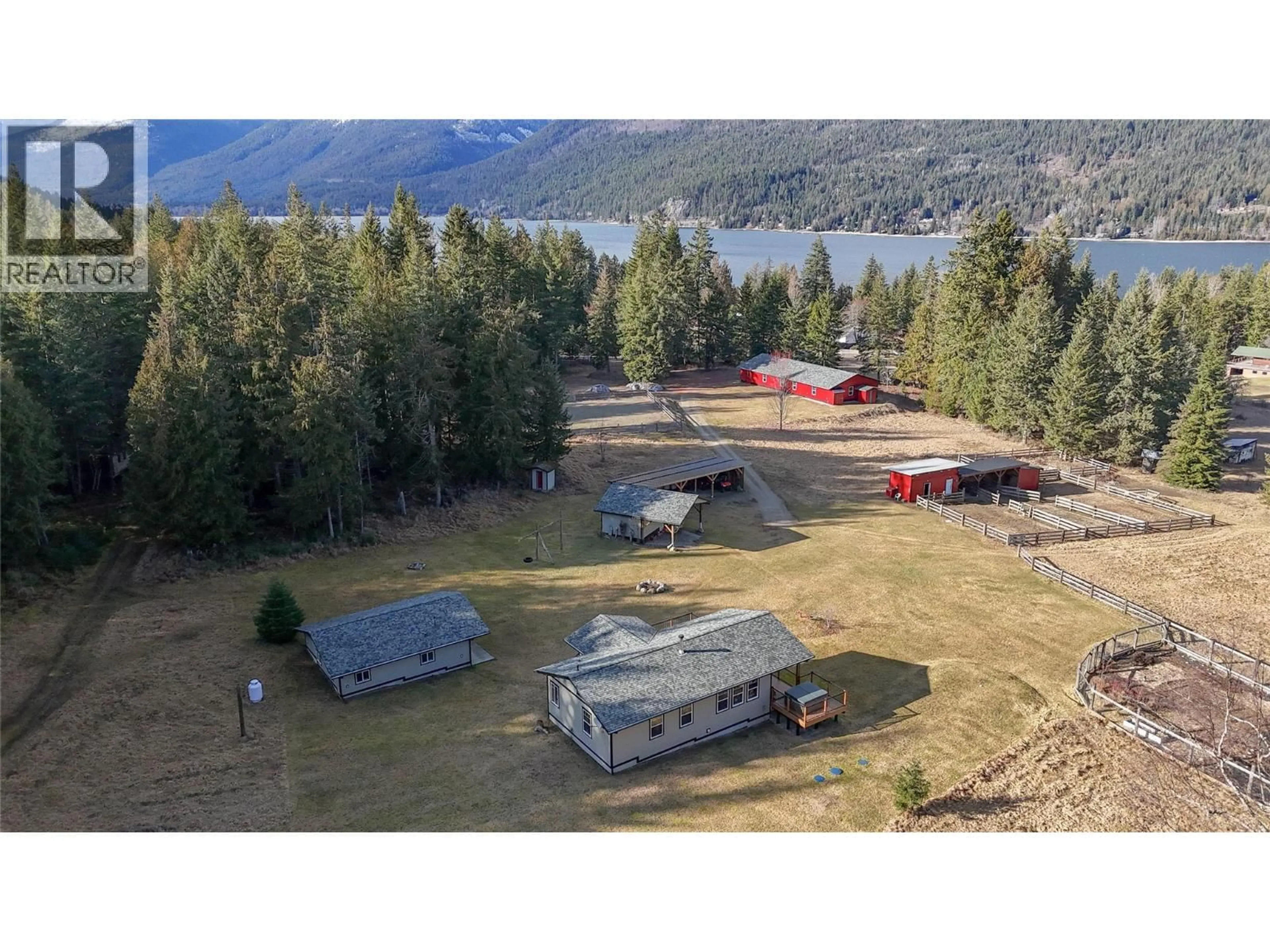 A pic from outside/outdoor area/front of a property/back of a property/a pic from drone, water/lake/river/ocean view for 784 LEWIS ROAD, Harrop British Columbia V1L6P7