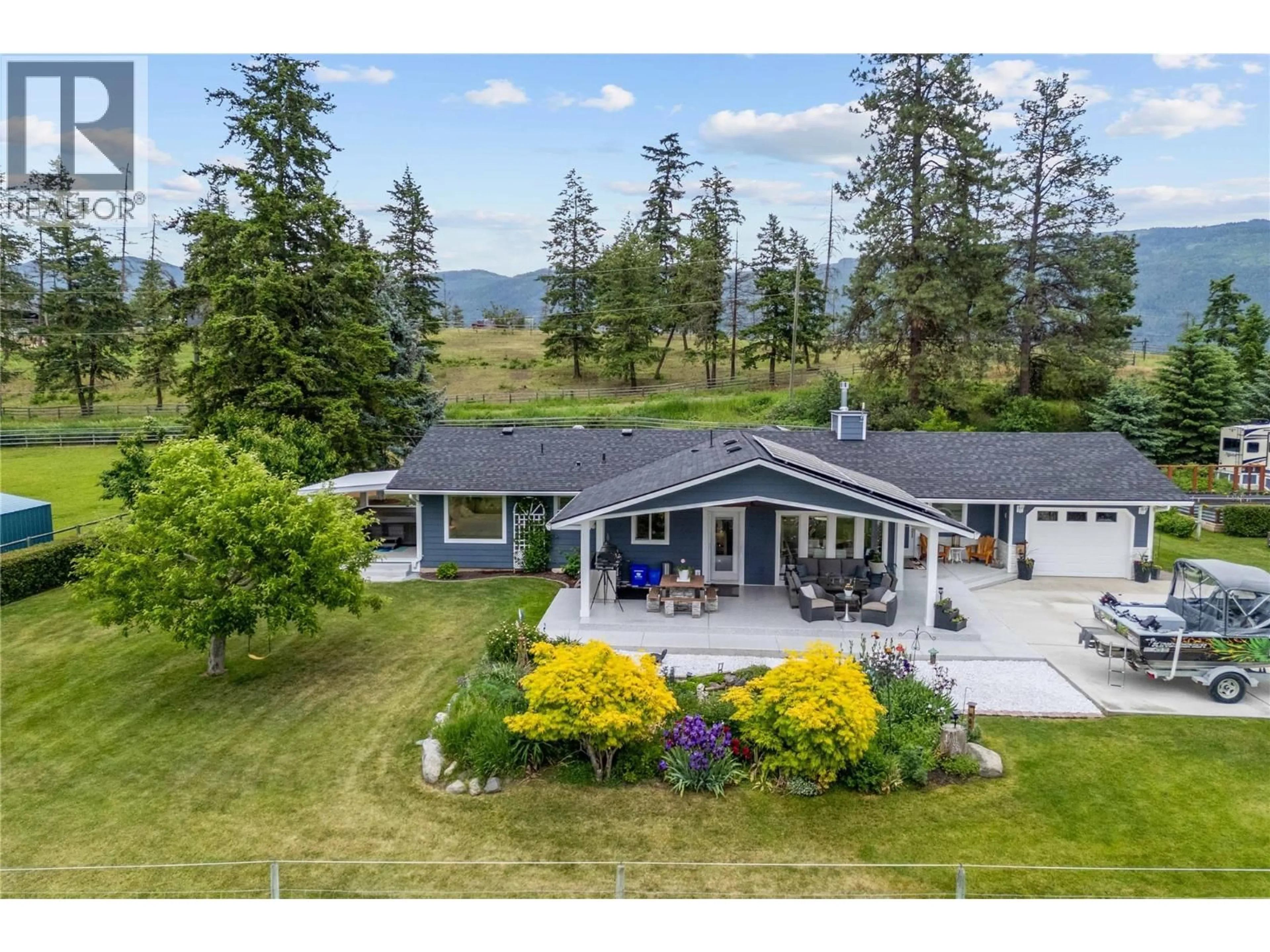 A pic from outside/outdoor area/front of a property/back of a property/a pic from drone, mountain view for 4911 MALPASS ROAD, Armstrong British Columbia V4Y0V5