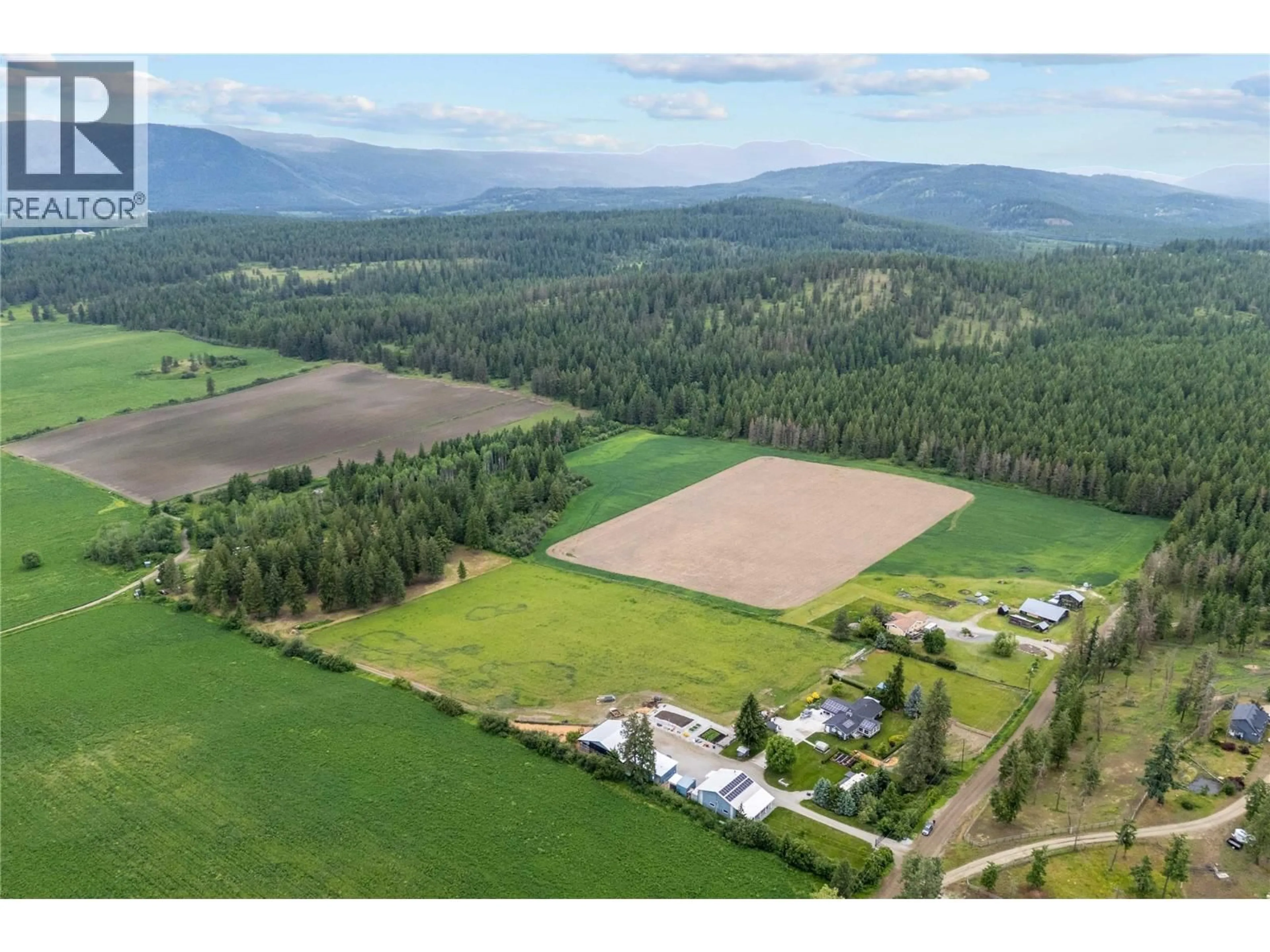 A pic from outside/outdoor area/front of a property/back of a property/a pic from drone, mountain view for 4911 MALPASS ROAD, Armstrong British Columbia V4Y0V5