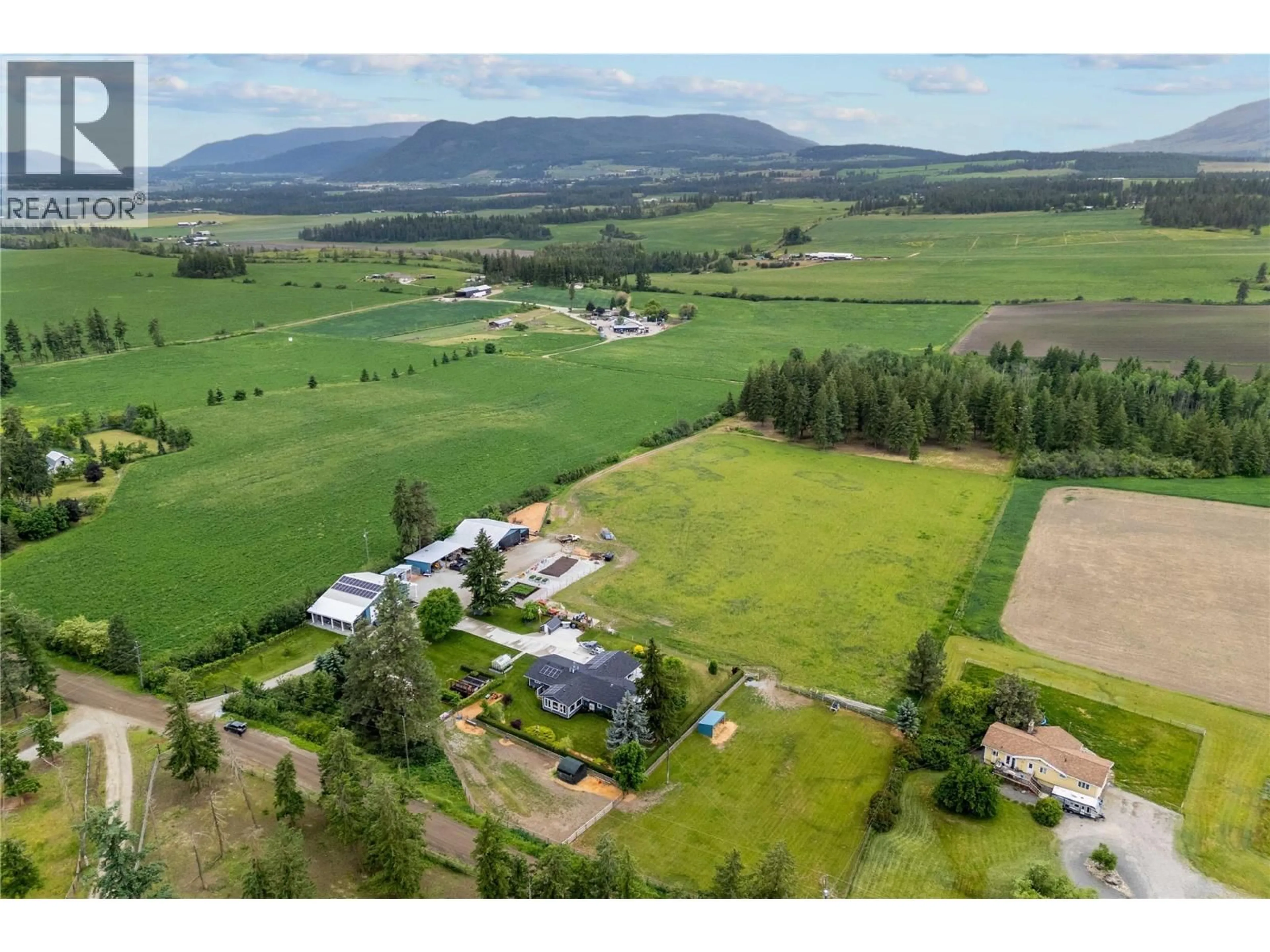 A pic from outside/outdoor area/front of a property/back of a property/a pic from drone, mountain view for 4911 MALPASS ROAD, Armstrong British Columbia V4Y0V5
