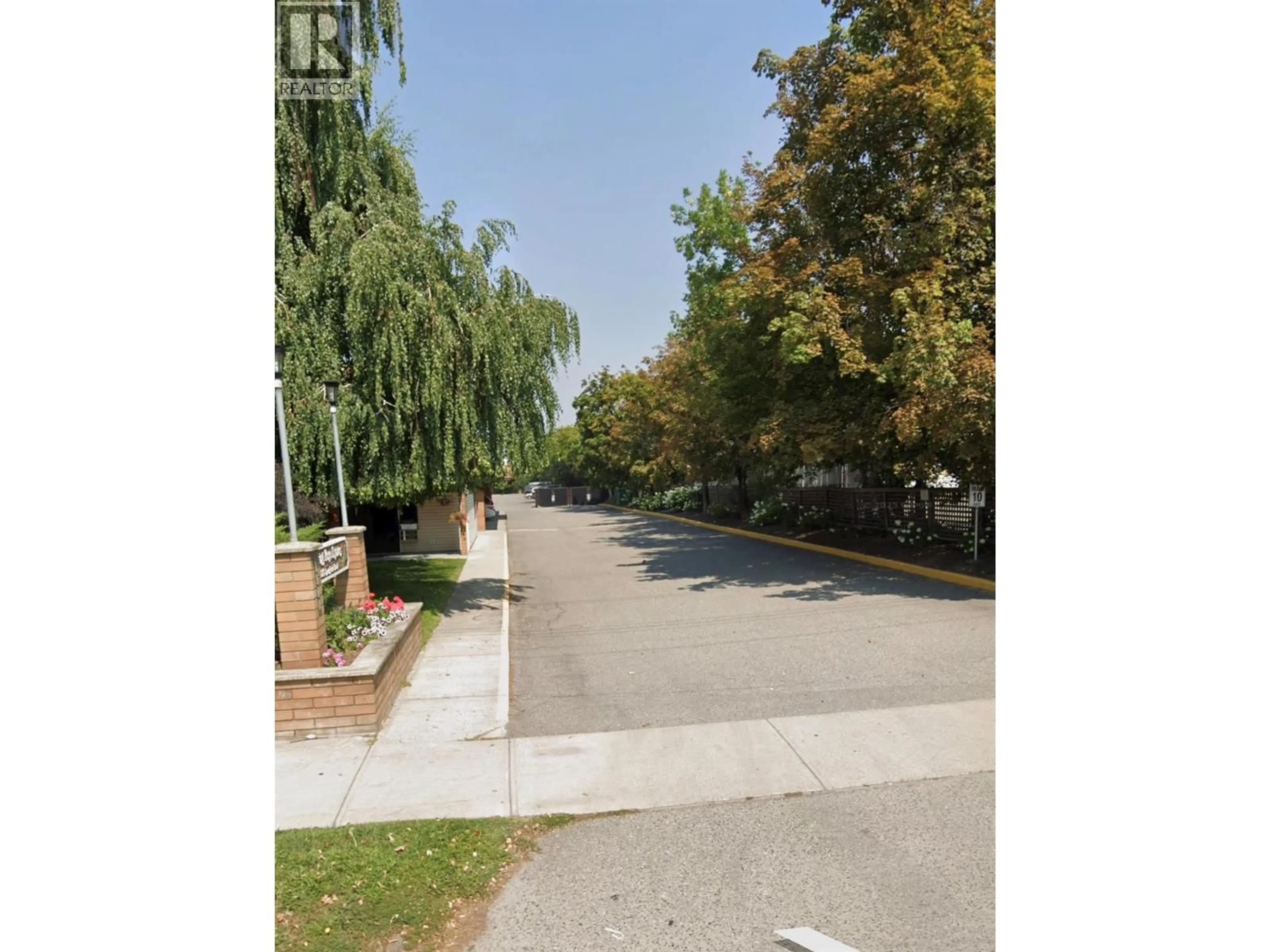 A pic from outside/outdoor area/front of a property/back of a property/a pic from drone, street for 205 - 1580 SPRINGFIELD ROAD, Kelowna British Columbia V1Y5V4