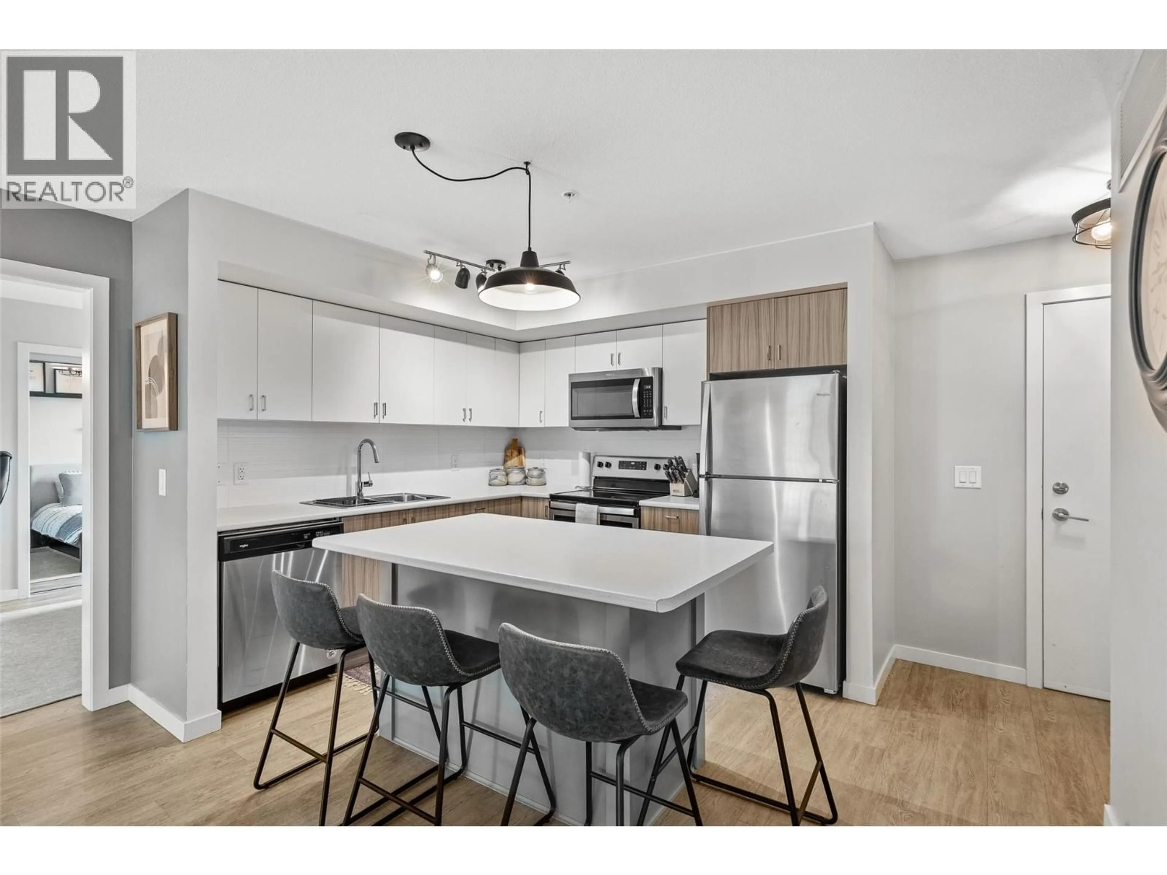 Open concept kitchen, unknown for 217 - 695 ACADEMY WAY, Kelowna British Columbia V1V0A2