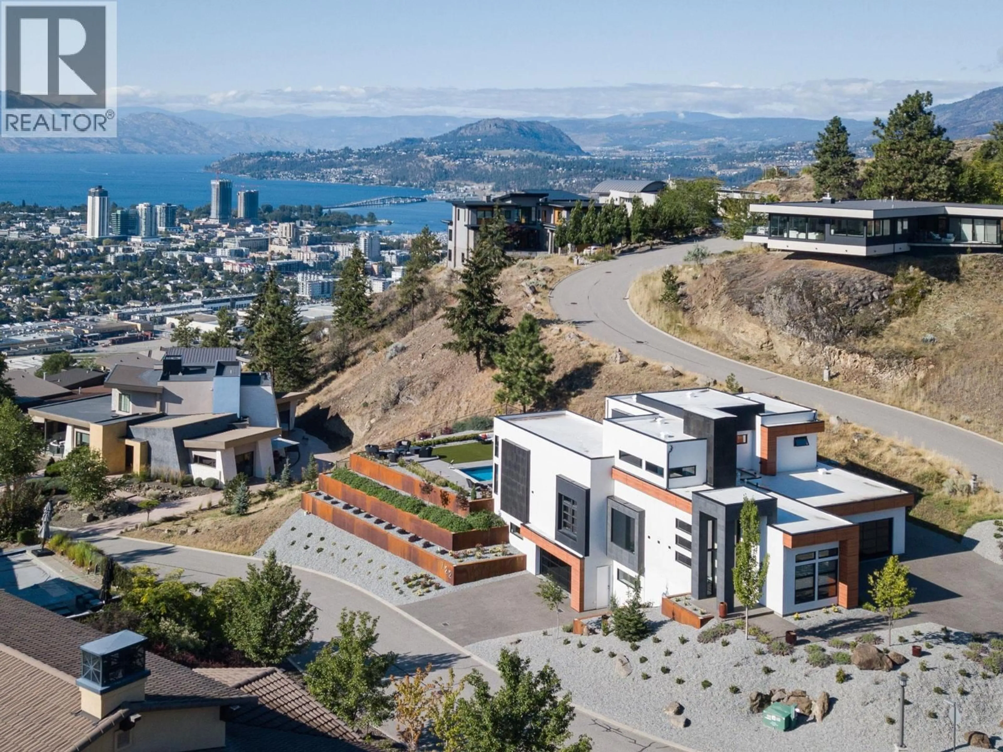 A pic from outside/outdoor area/front of a property/back of a property/a pic from drone, mountain view for 722 HIGHPOINTE PLACE, Kelowna British Columbia V1V2Y3