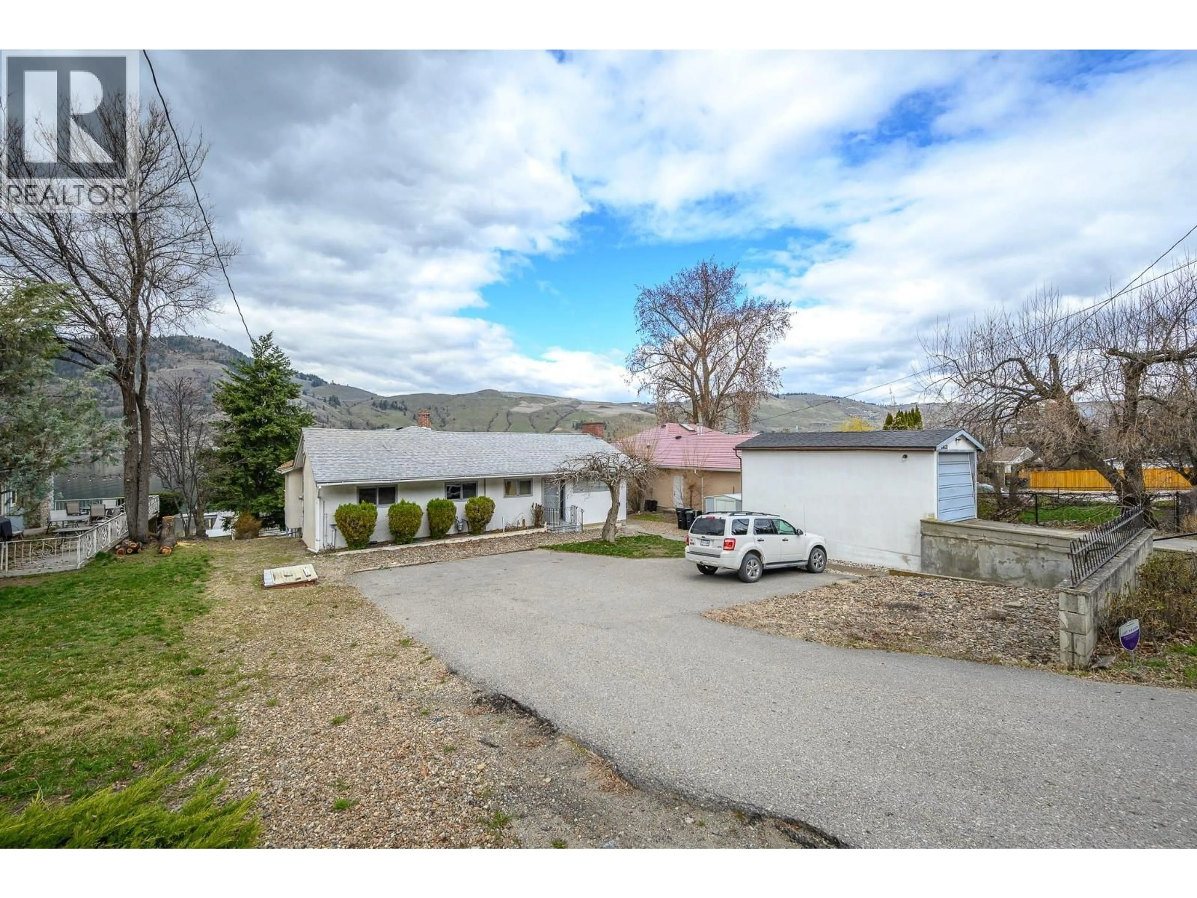 A pic from outside/outdoor area/front of a property/back of a property/a pic from drone, mountain view for 8121 OKANAGAN LANDING ROAD, Vernon British Columbia V1H1J4