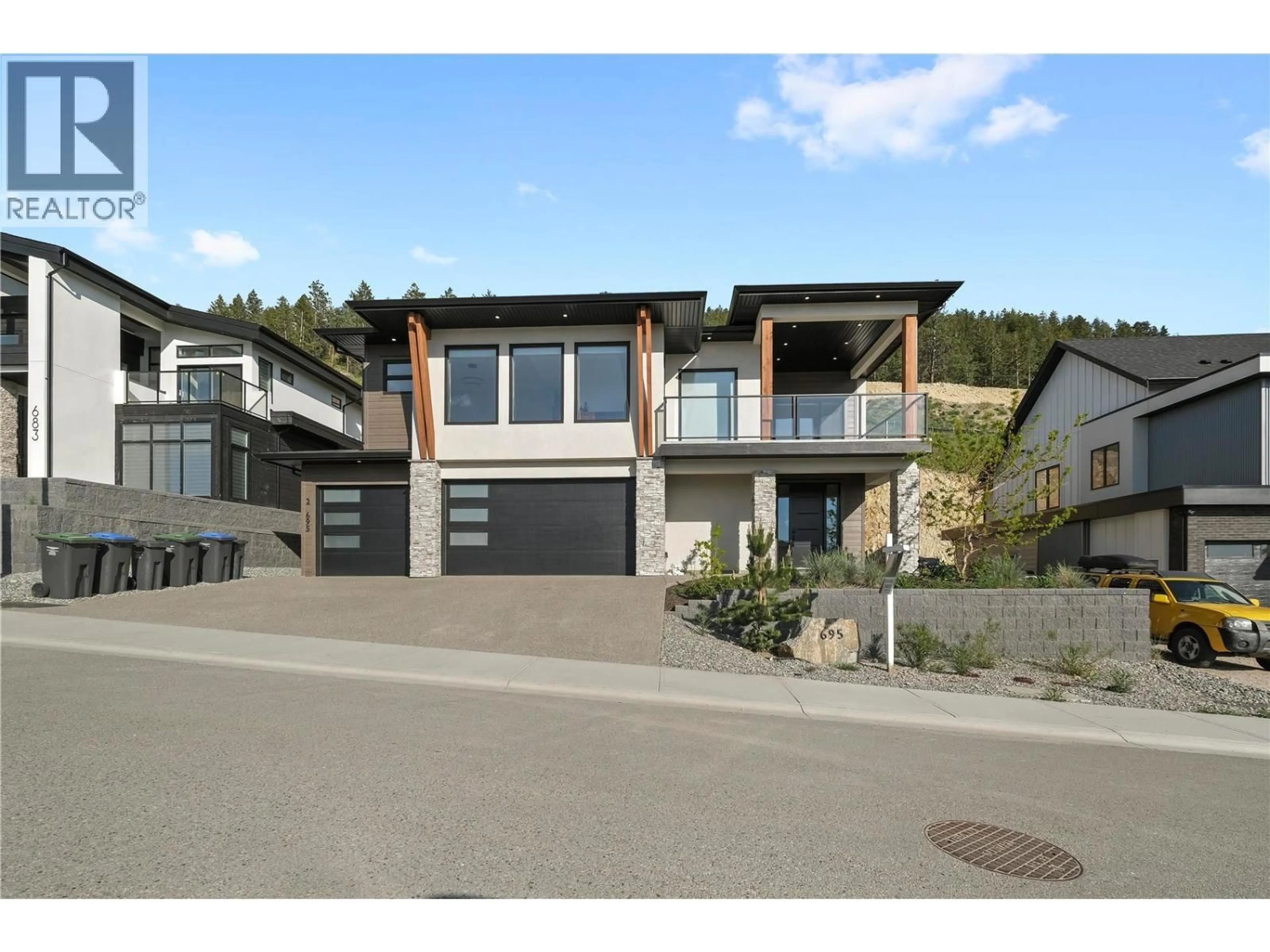 Home with brick exterior material, street for 695 DEANS DRIVE, Kelowna British Columbia V1P1A1