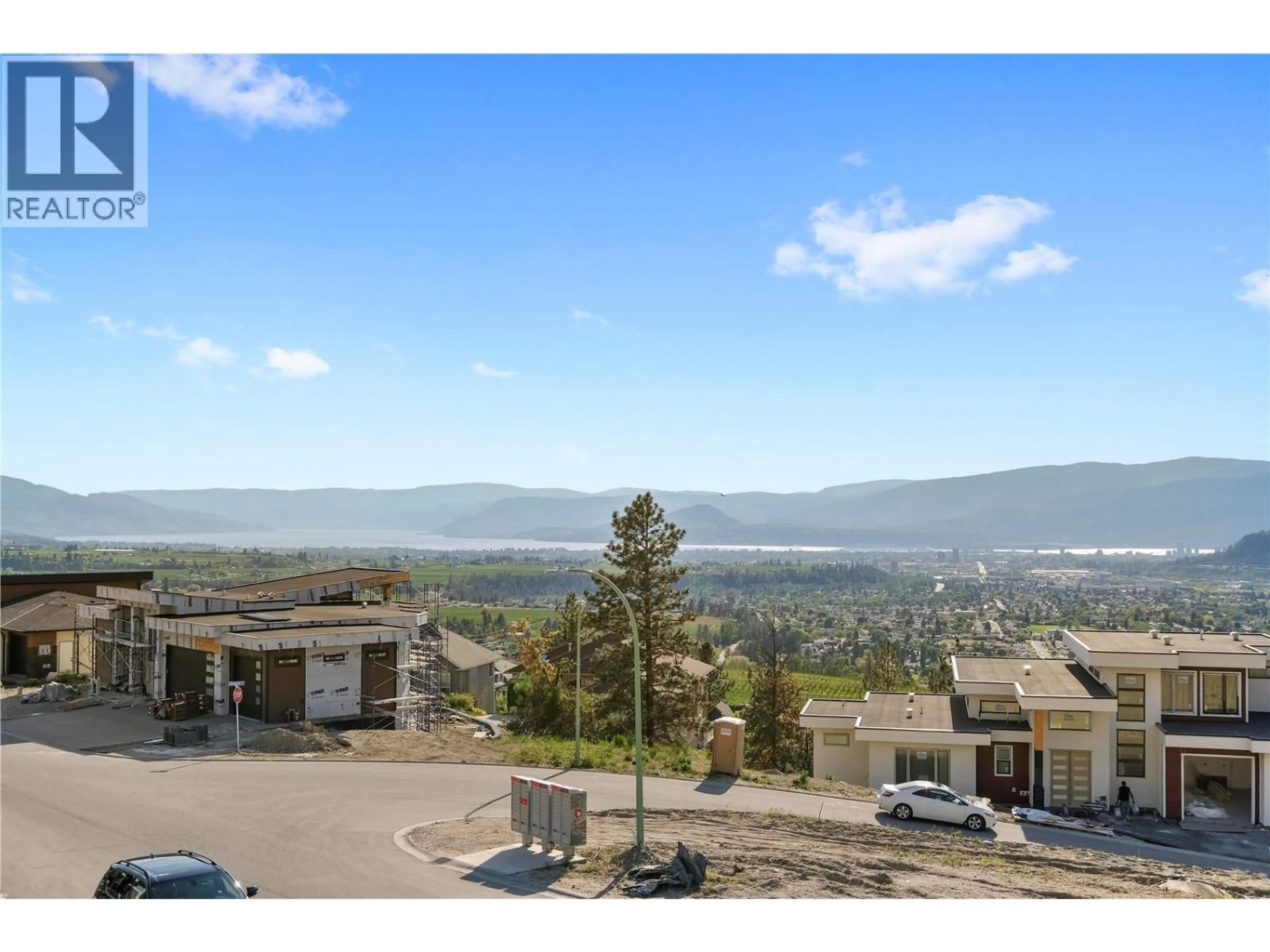 A pic from outside/outdoor area/front of a property/back of a property/a pic from drone, mountain view for 695 DEANS DRIVE, Kelowna British Columbia V1P1A1