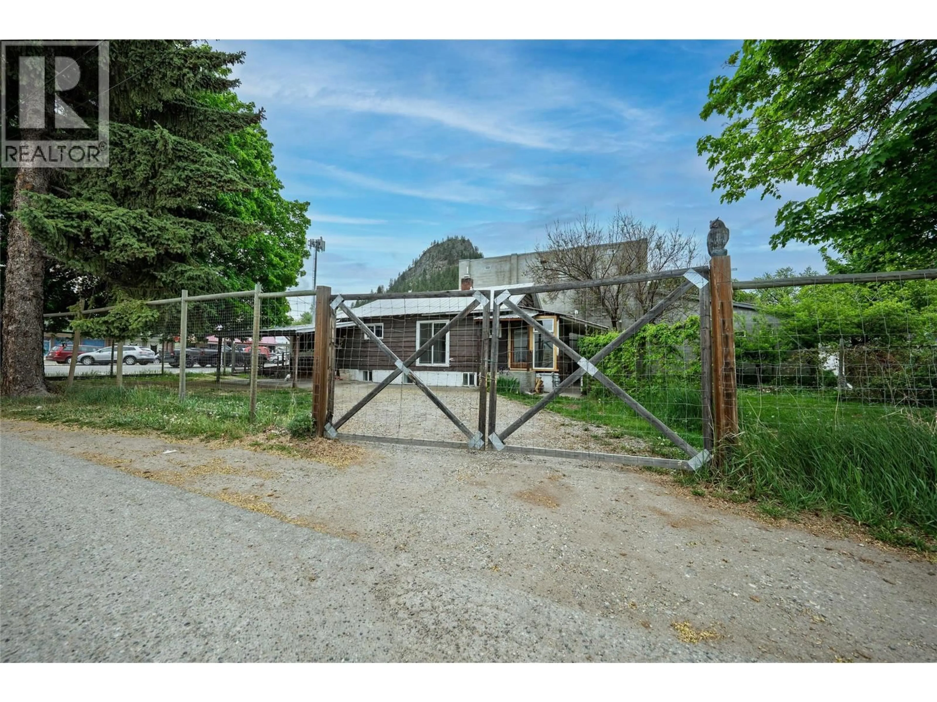 A pic from outside/outdoor area/front of a property/back of a property/a pic from drone, street for 7440 3RD STREET, Grand Forks British Columbia V0H1H0
