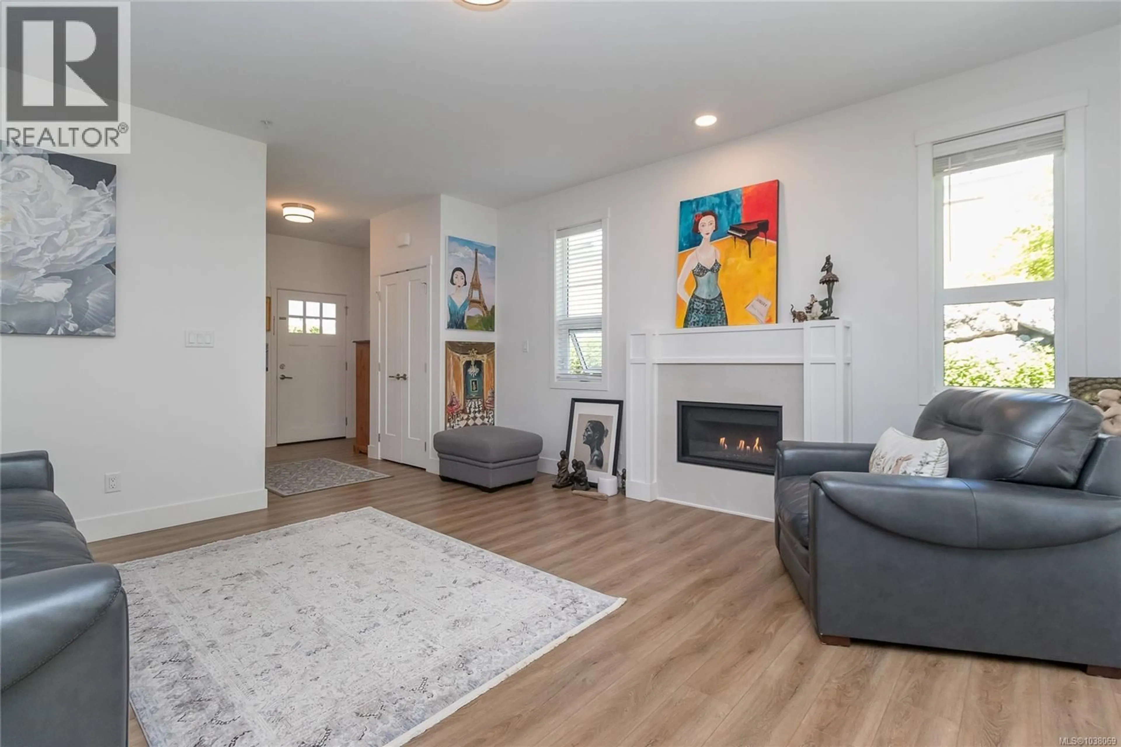 Living room with furniture, wood/laminate floor for 14 - 265 CASPIAN DRIVE, Colwood British Columbia V9C0P8