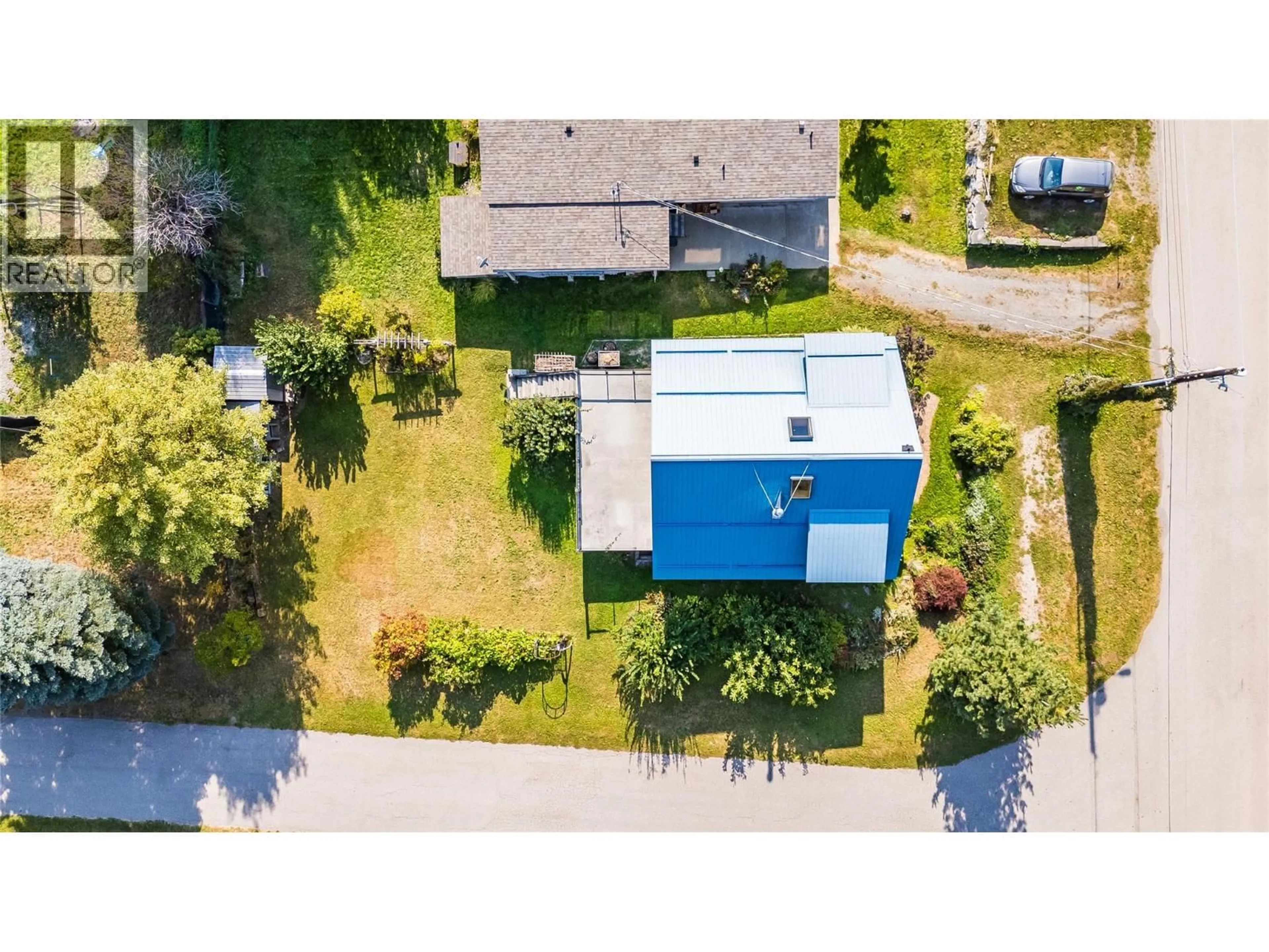 A pic from outside/outdoor area/front of a property/back of a property/a pic from drone, street for 130 8TH STREET NORTH, Kaslo British Columbia V0G1M0