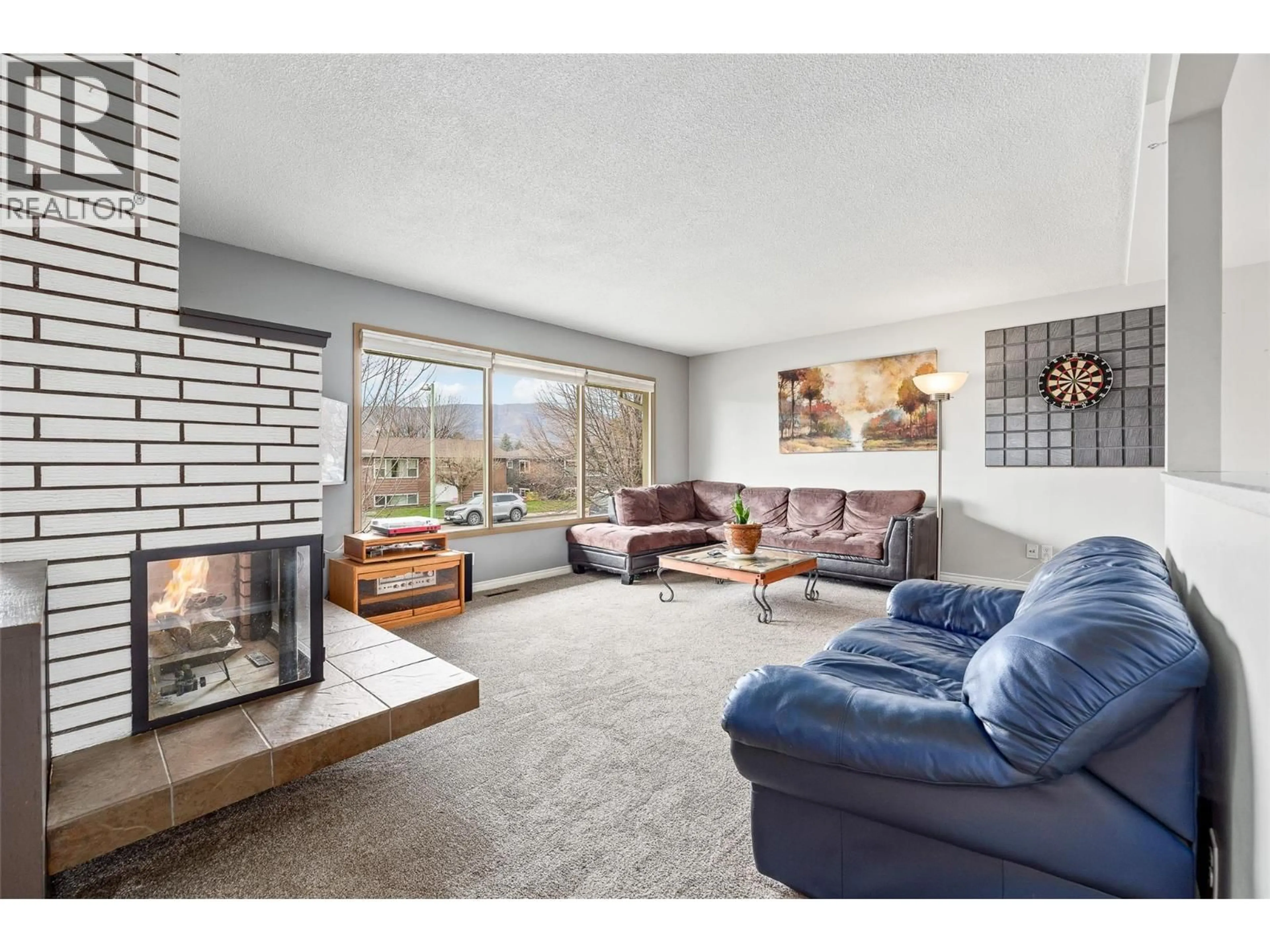 Living room with furniture, unknown for 1394 LOMBARDY SQUARE, Kelowna British Columbia V1Y3S4