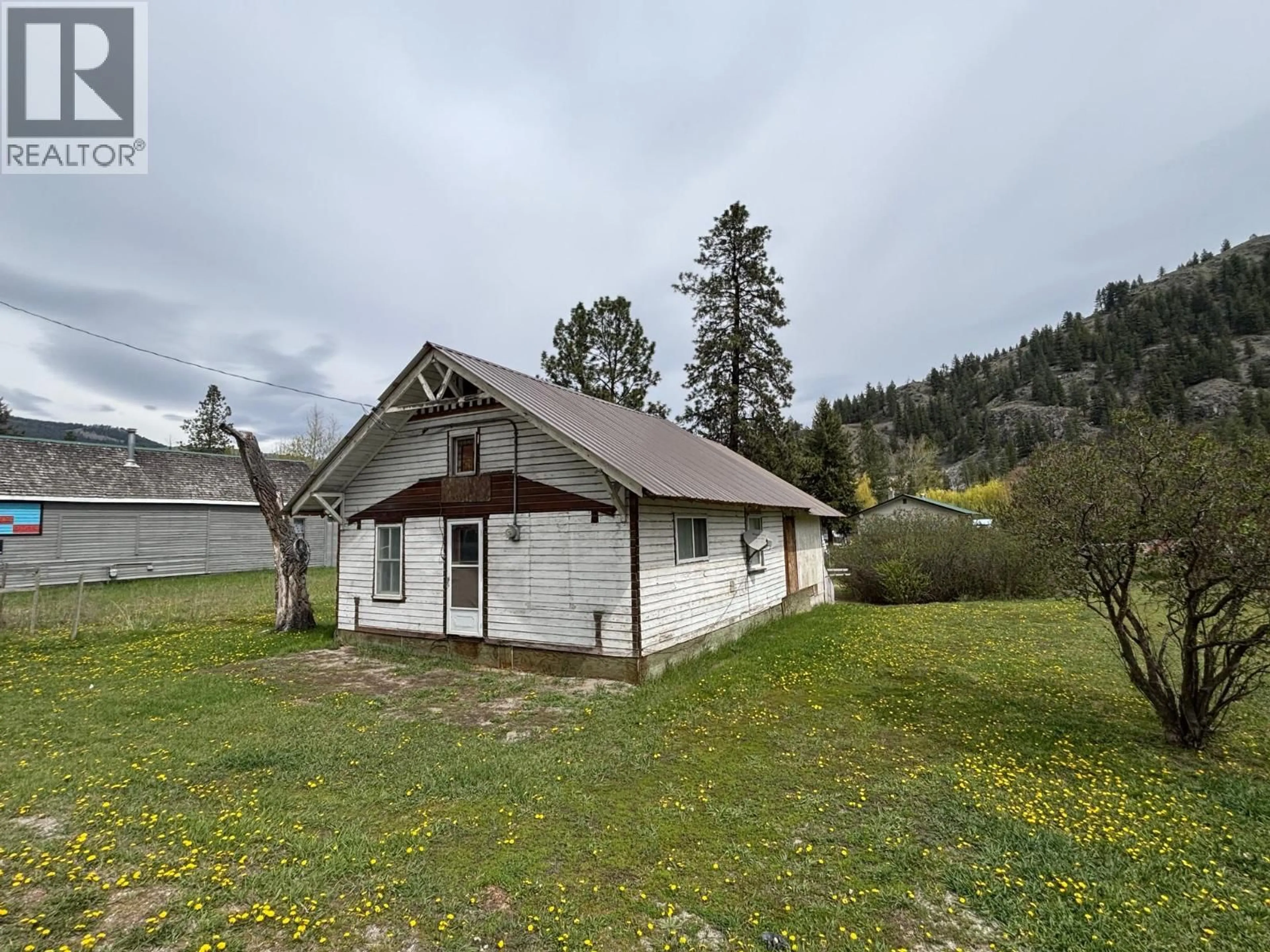 A pic from outside/outdoor area/front of a property/back of a property/a pic from drone, building for 4123 3 HIGHWAY, Rock Creek British Columbia V0H1Y0