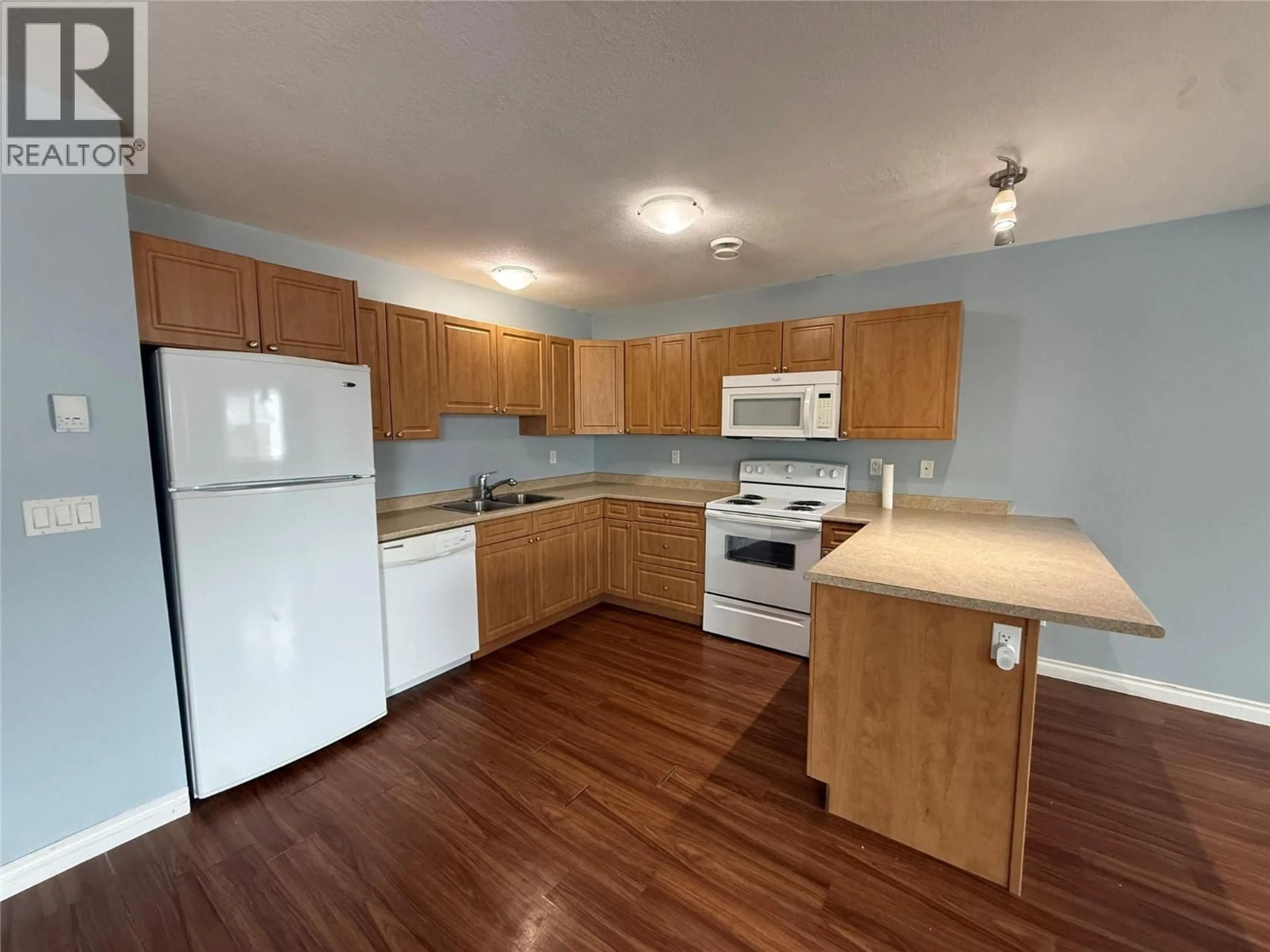 Standard kitchen, wood/laminate floor for 804 88 STREET, Dawson Creek British Columbia V1G0C9