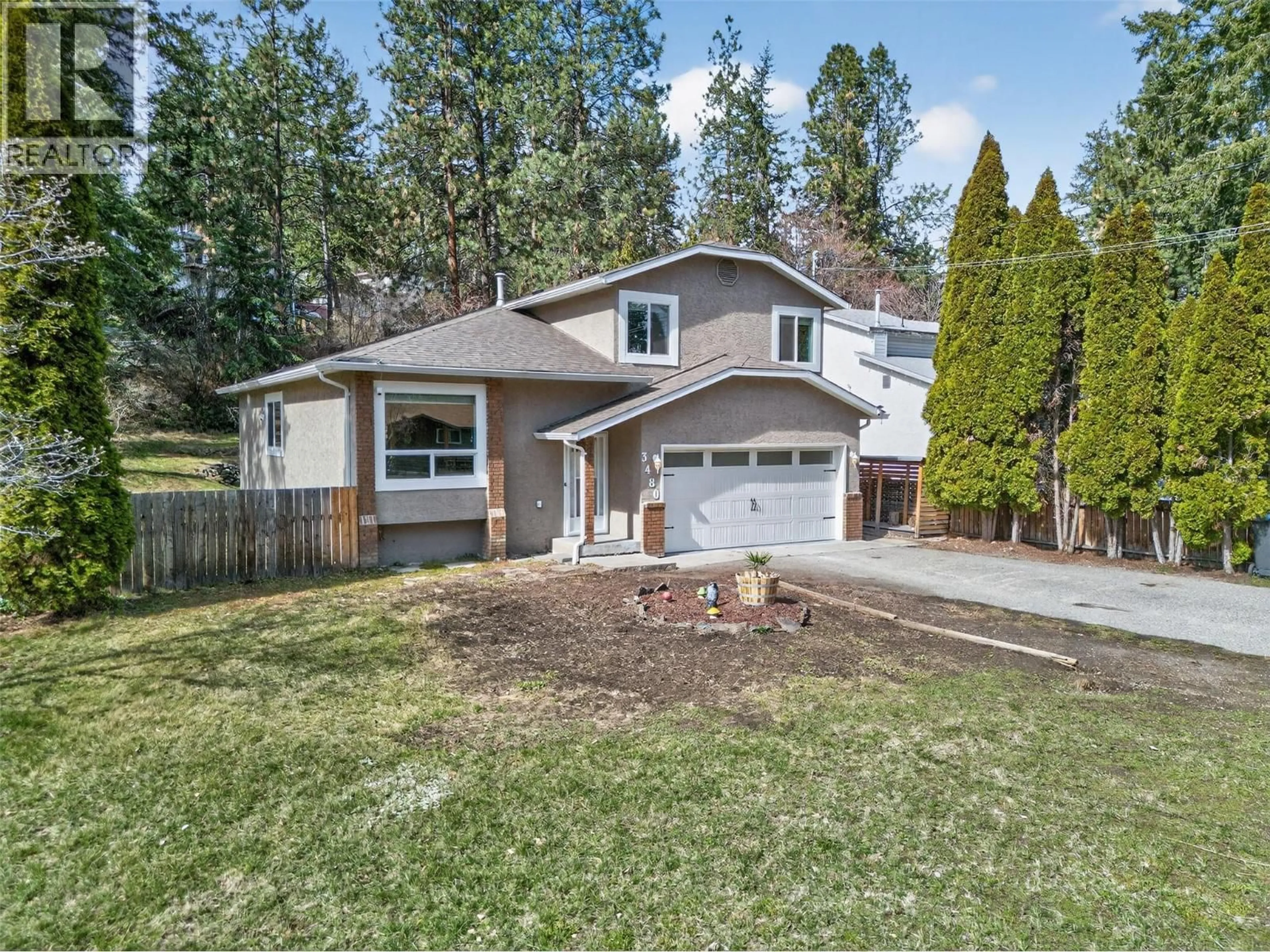 Home with vinyl exterior material, street for 3480 MCTAGGART ROAD, West Kelowna British Columbia V4T1H6