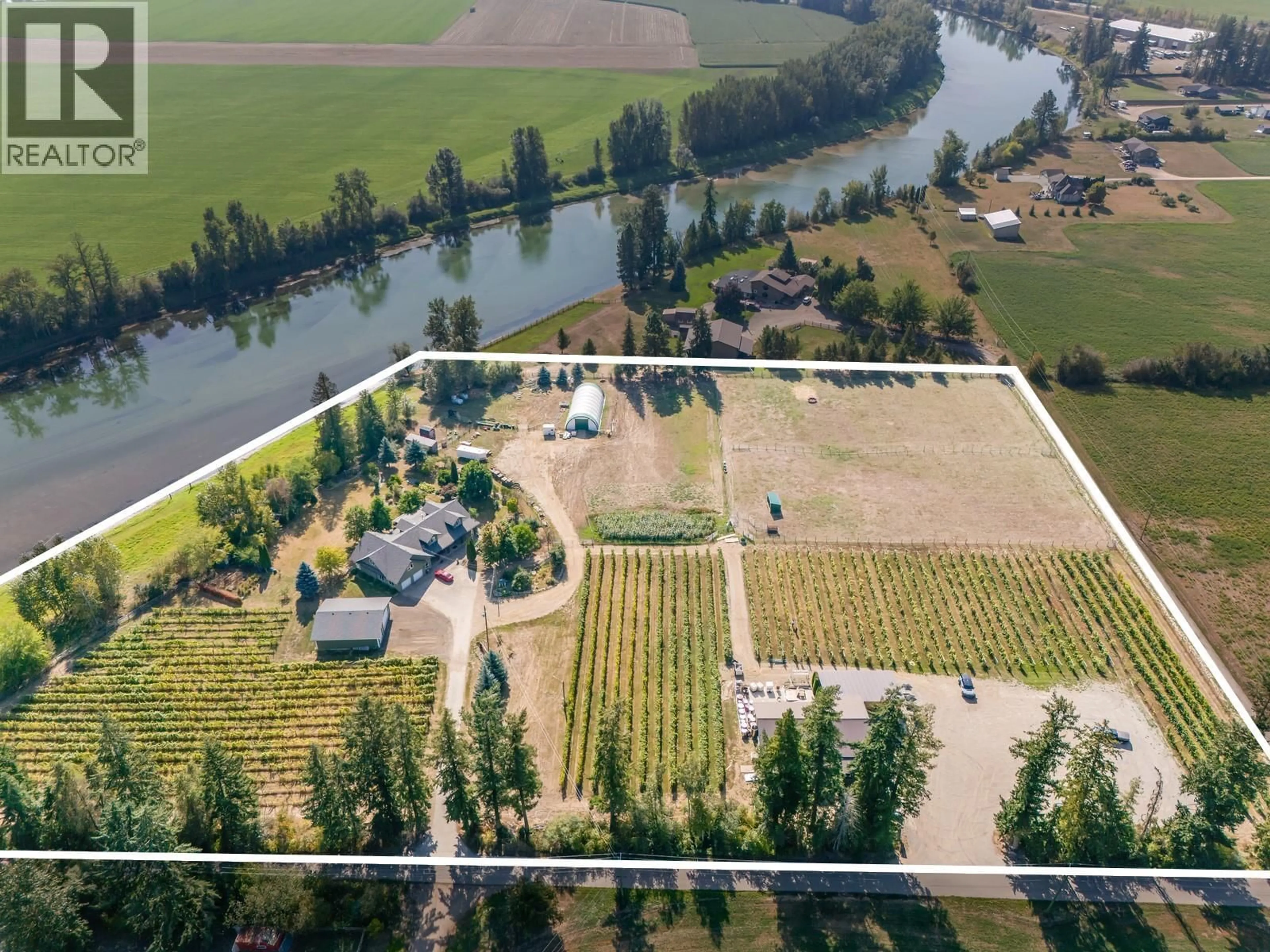 A pic from outside/outdoor area/front of a property/back of a property/a pic from drone, water/lake/river/ocean view for 70 WATERSIDE ROAD, Enderby British Columbia V0E1V3