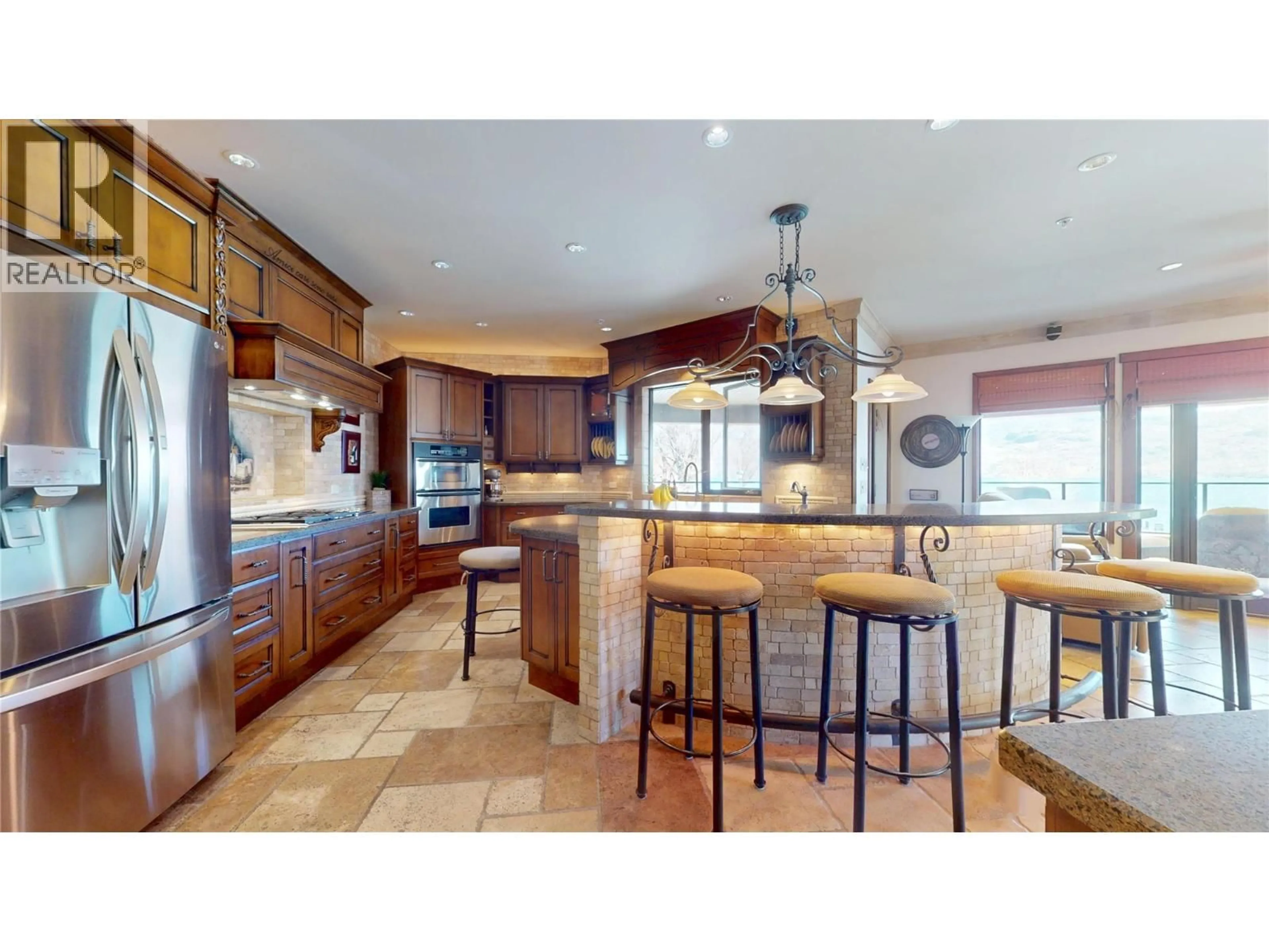 Open concept kitchen, ceramic/tile floor for 201 - 4200 BEACH AVENUE, Peachland British Columbia V0H1X6