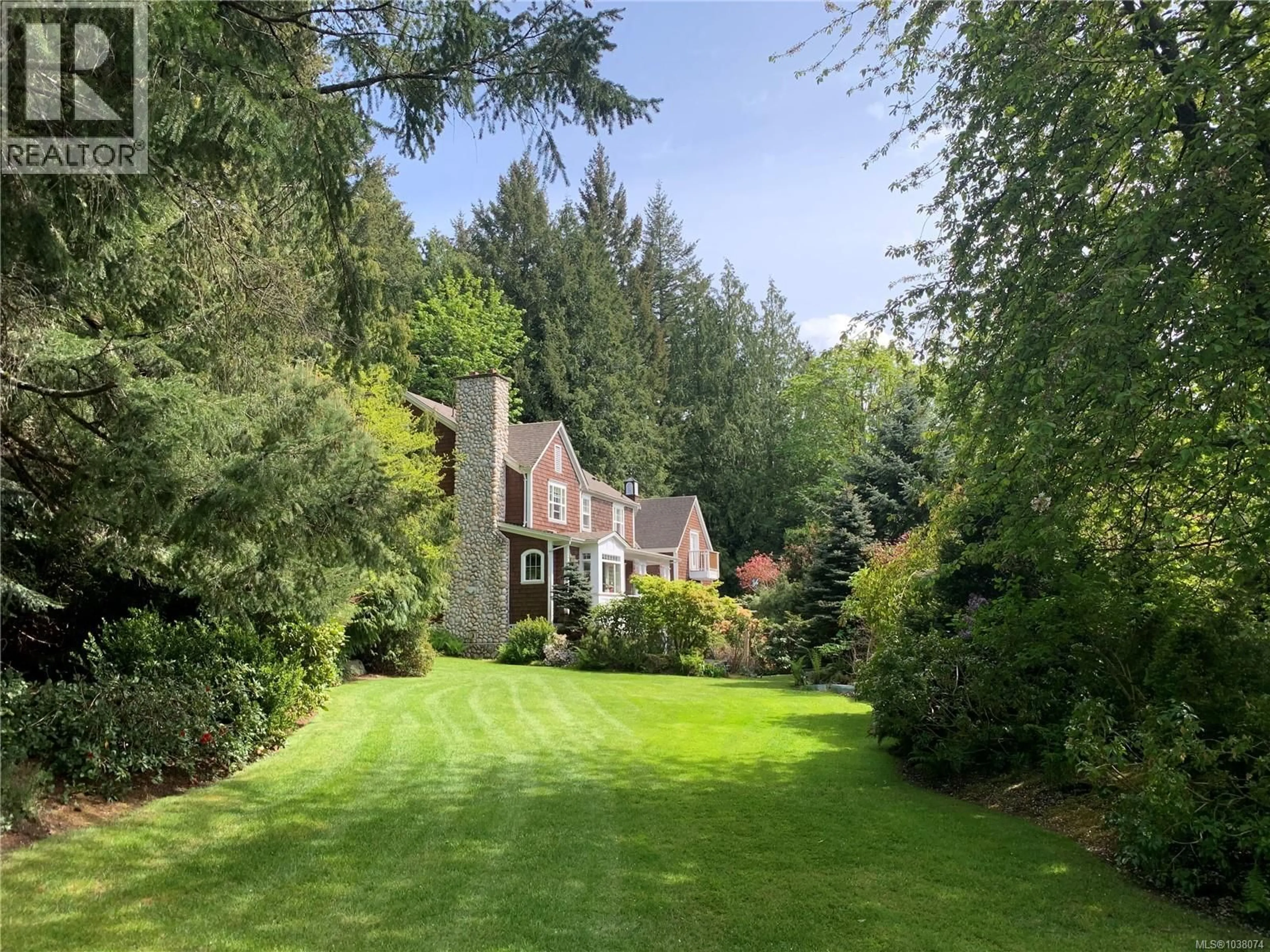 A pic from outside/outdoor area/front of a property/back of a property/a pic from drone, forest/trees view for 1188 GARDEN GATE DRIVE, Central Saanich British Columbia V8M2H6