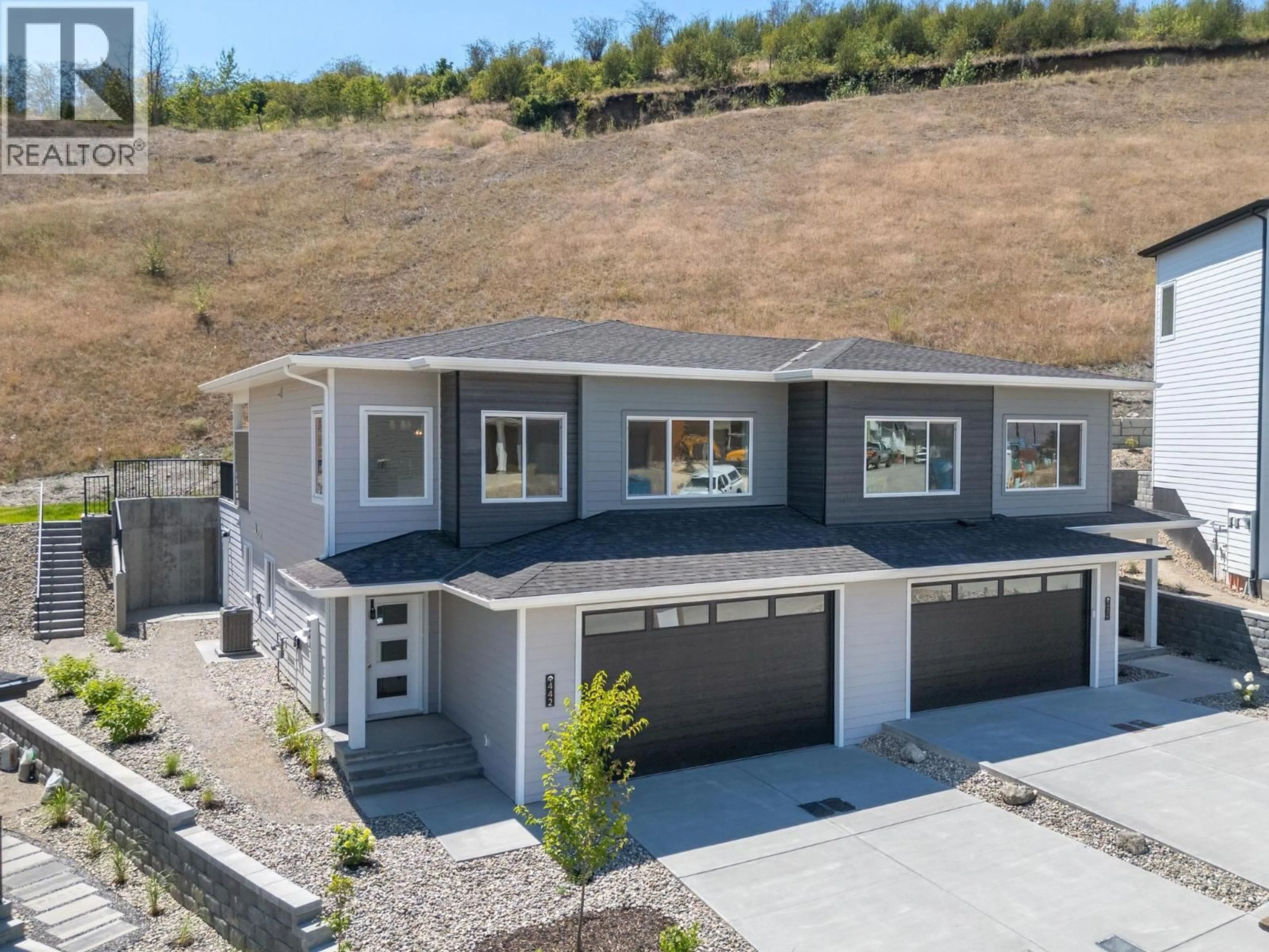 Home with vinyl exterior material, street for 442 ARROWLEAF RISE, Coldstream British Columbia V1B2M4