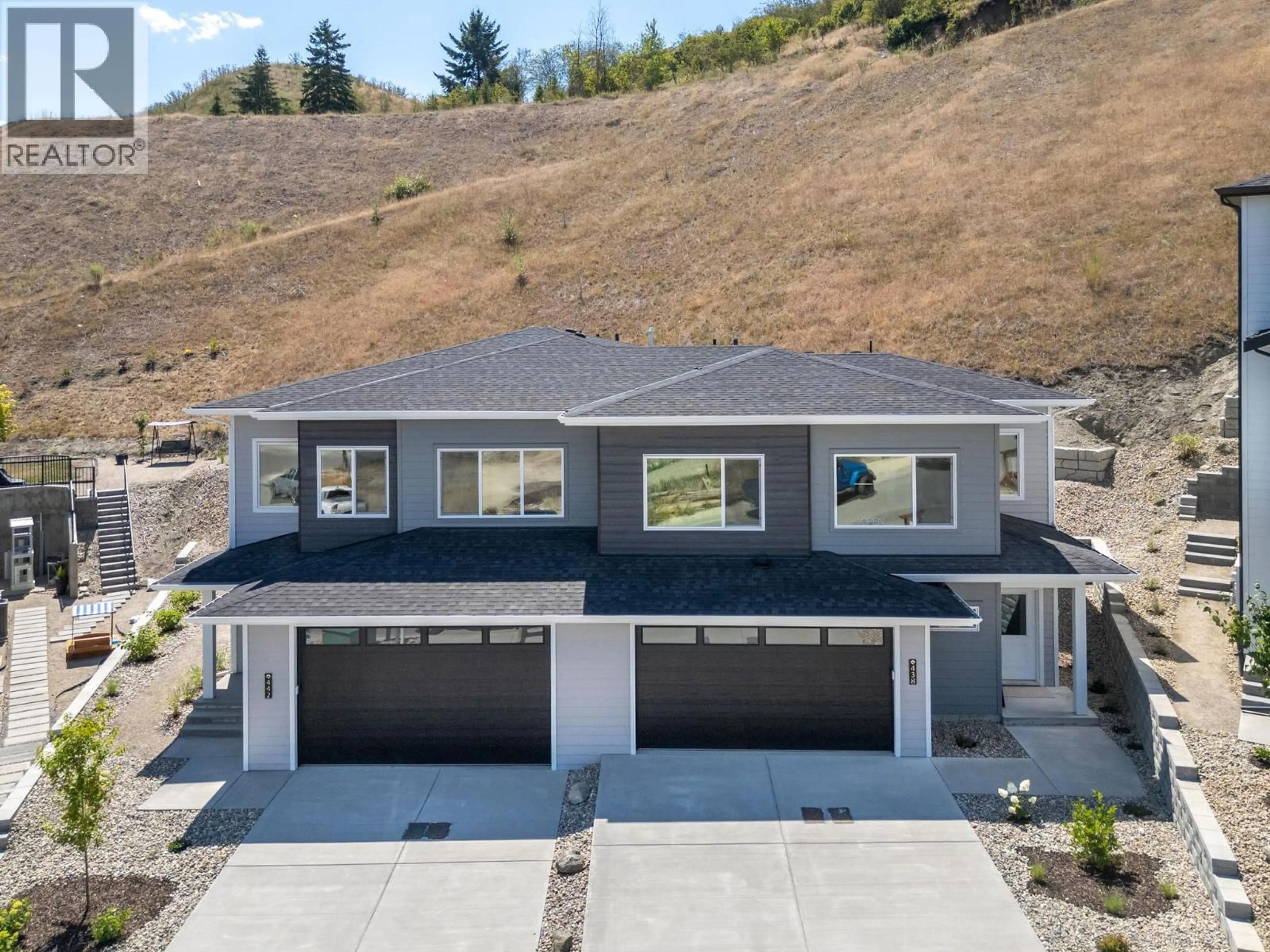 A pic from outside/outdoor area/front of a property/back of a property/a pic from drone, unknown for 442 ARROWLEAF RISE, Coldstream British Columbia V1B2M4