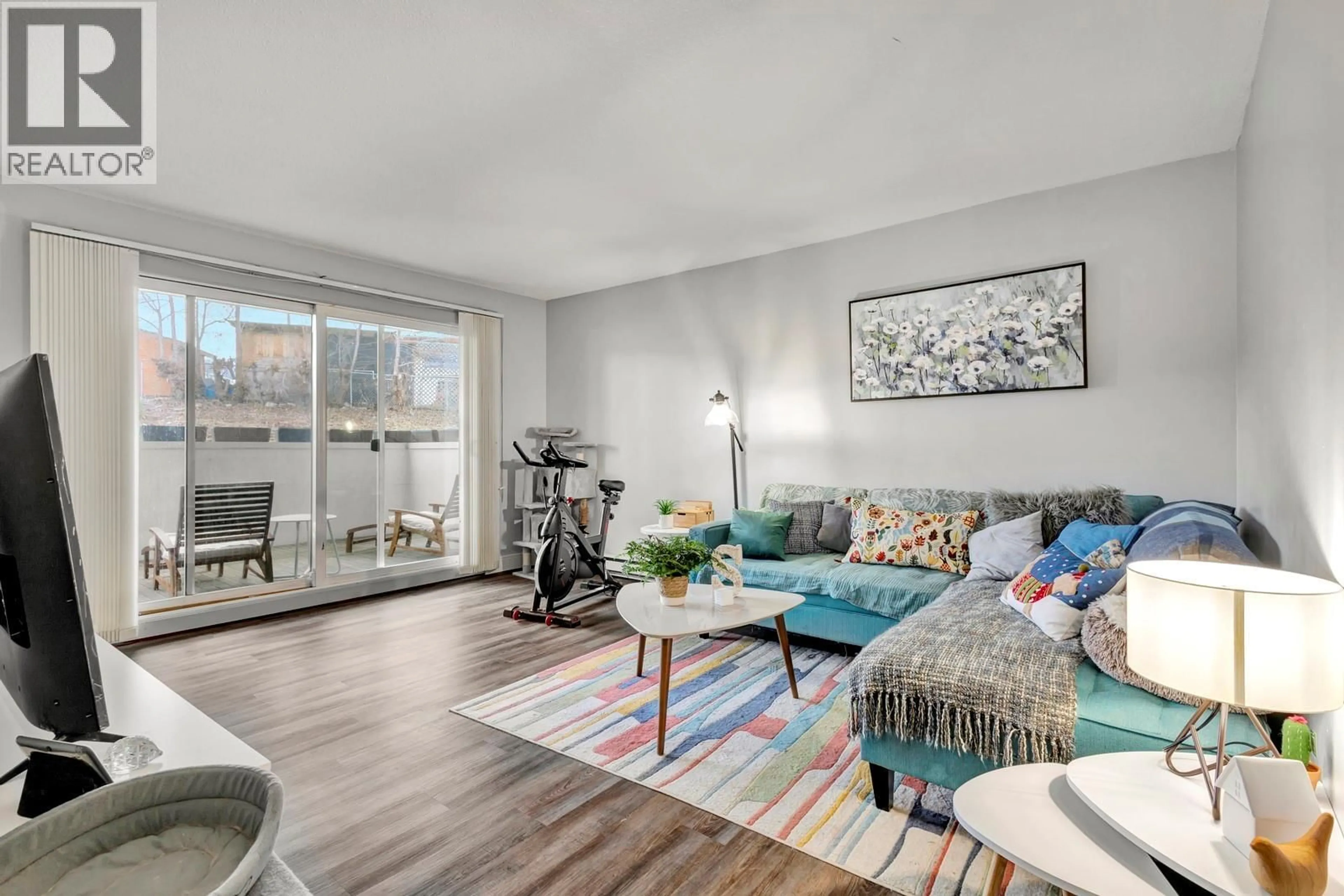 Living room with furniture, unknown for 104 - 445 ALL STAR COURT, Kelowna British Columbia V1X5N7