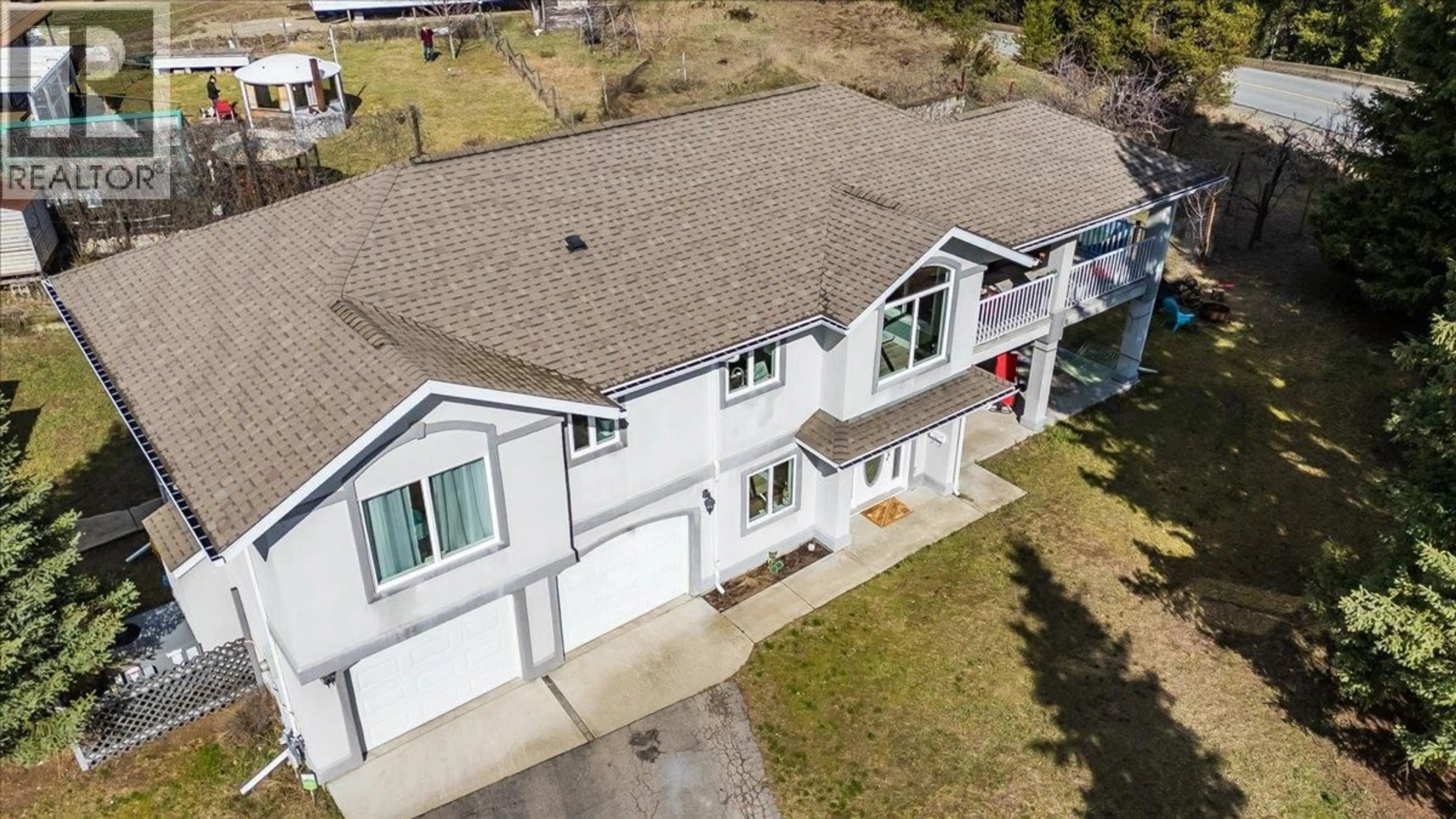 A pic from outside/outdoor area/front of a property/back of a property/a pic from drone, unknown for 601 12TH AVENUE, Genelle British Columbia V0G1G0