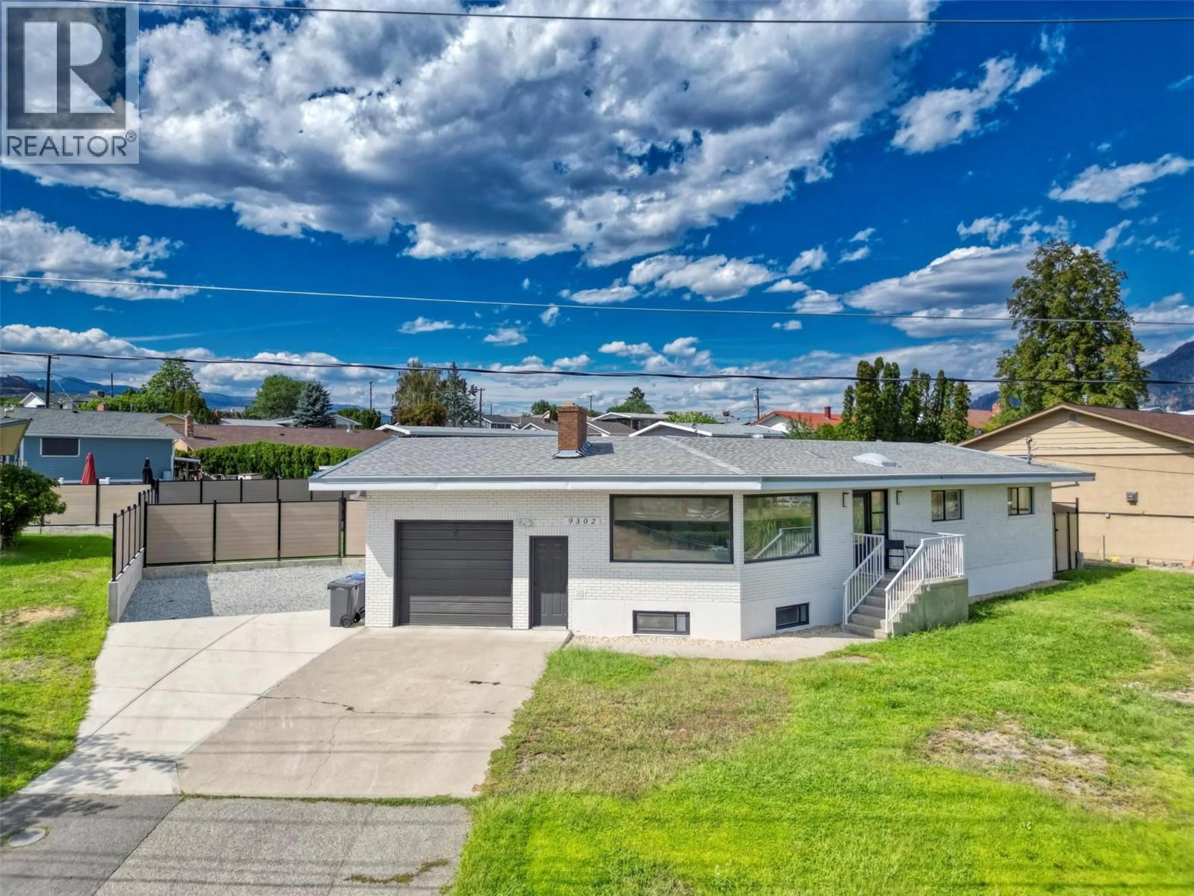 A pic from outside/outdoor area/front of a property/back of a property/a pic from drone, street for 9302 62ND AVENUE, Osoyoos British Columbia V0H1V1