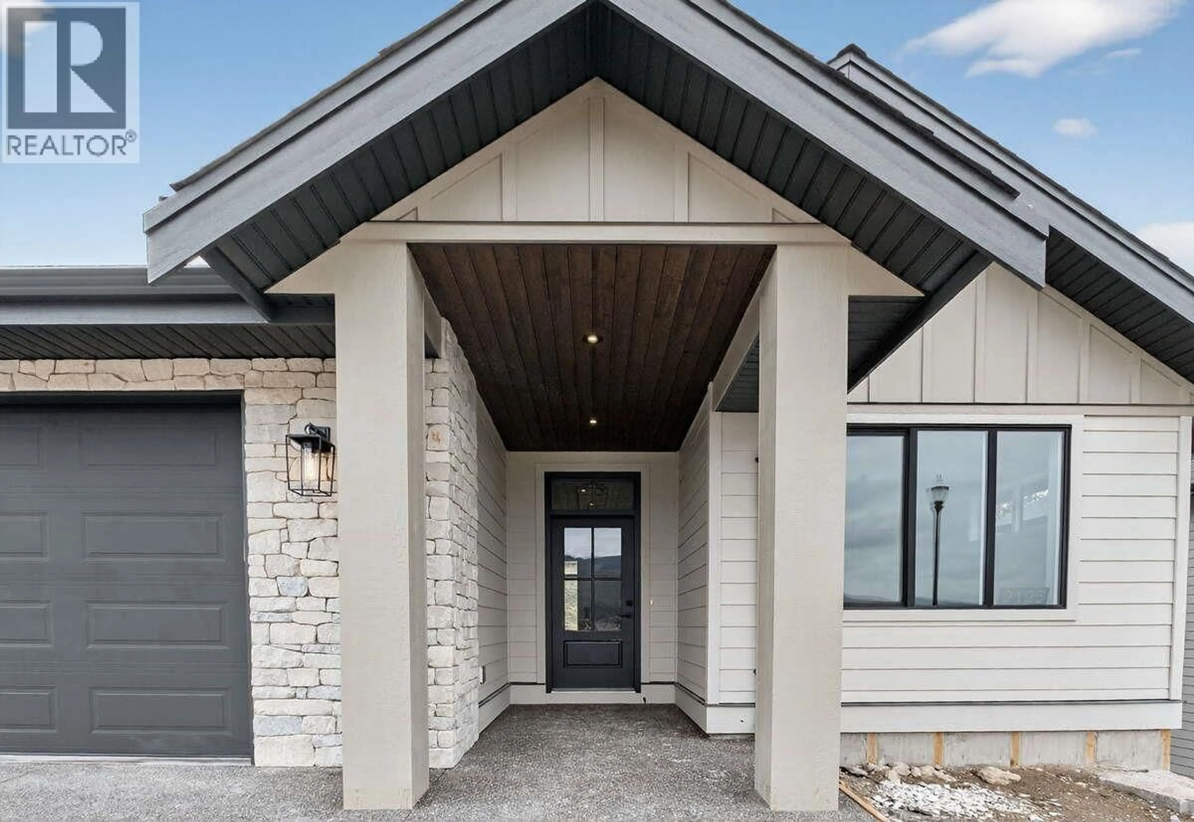 Home with brick exterior material, street for 2125 MONTENEGRO DRIVE, Kelowna British Columbia V1P0B2