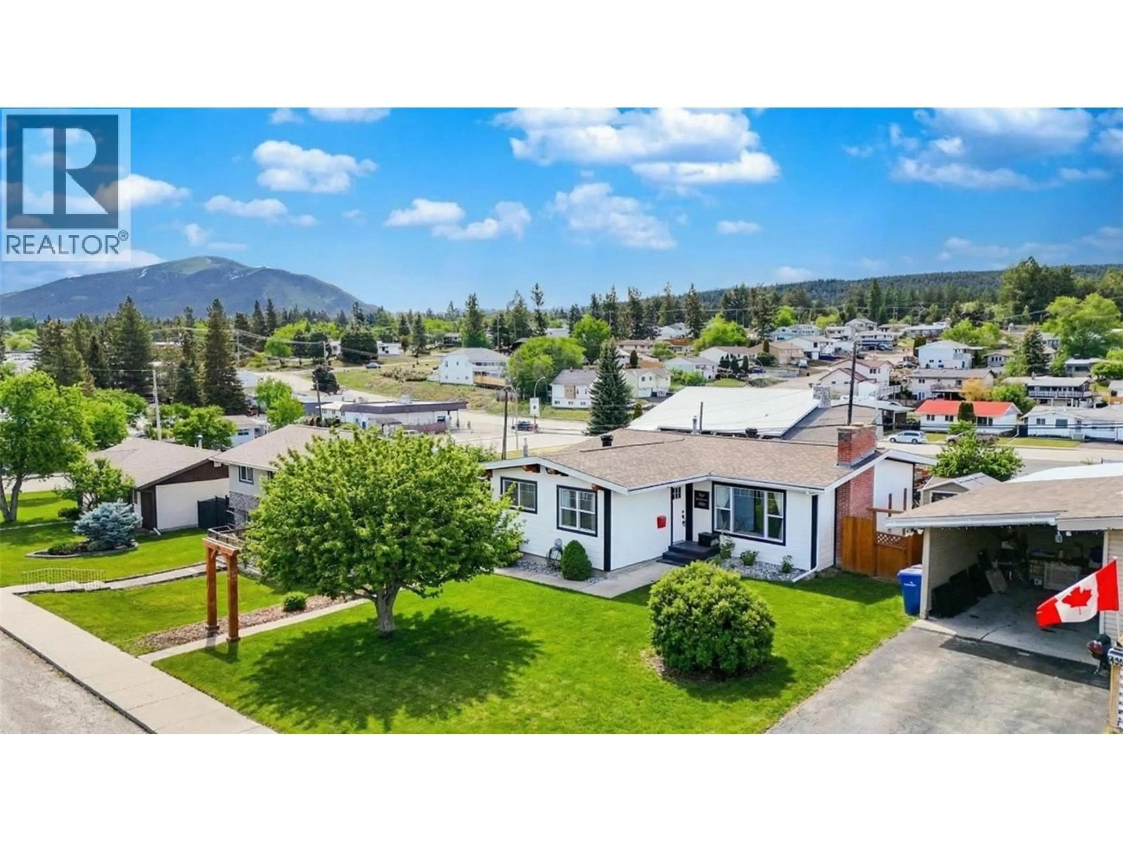 A pic from outside/outdoor area/front of a property/back of a property/a pic from drone, mountain view for 915 10TH STREET SOUTH, Cranbrook British Columbia V1C1S9