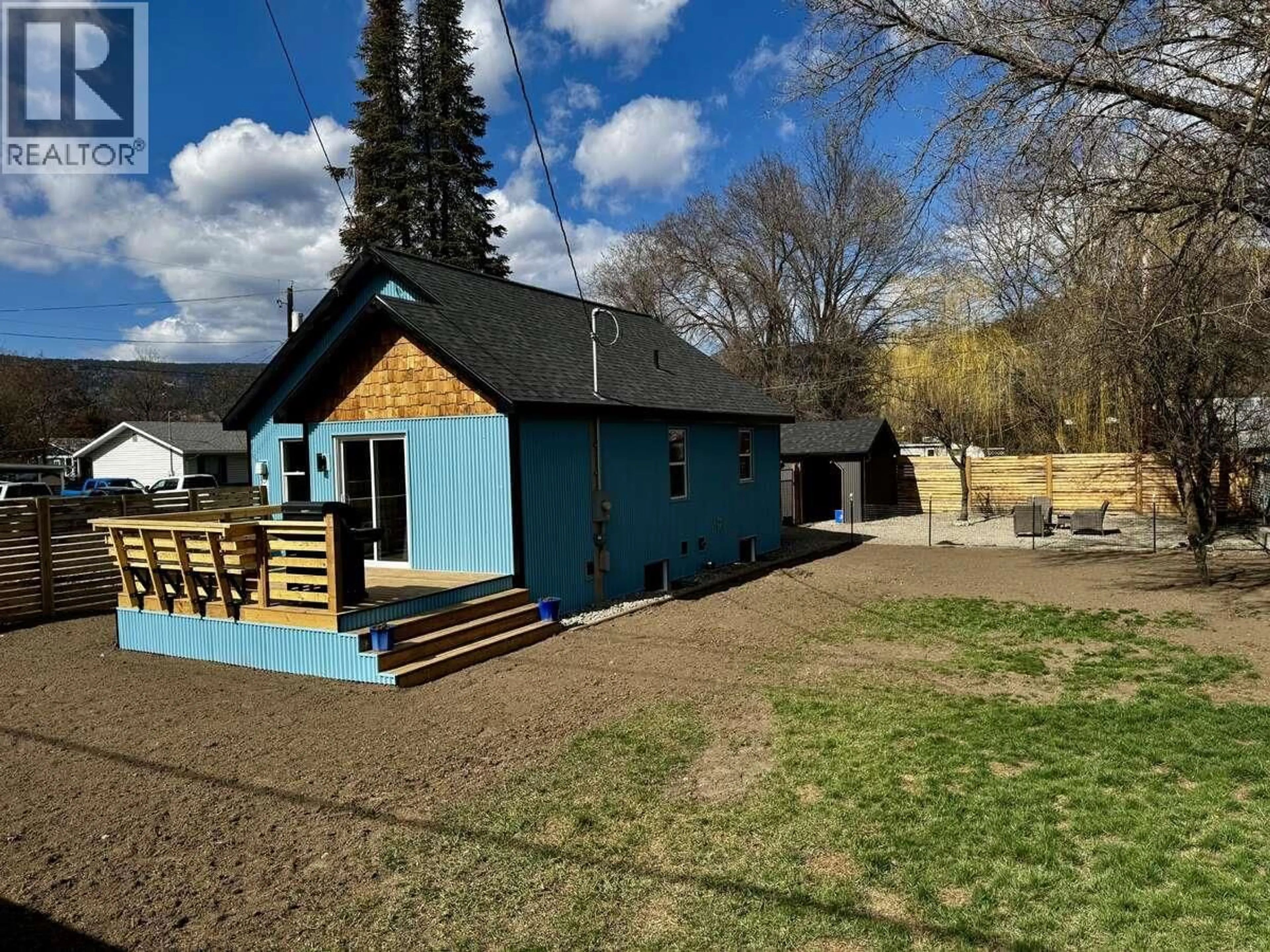 A pic from outside/outdoor area/front of a property/back of a property/a pic from drone, mountain view for 987 KETTLE RIVER DRIVE, Grand Forks British Columbia V0H1H0