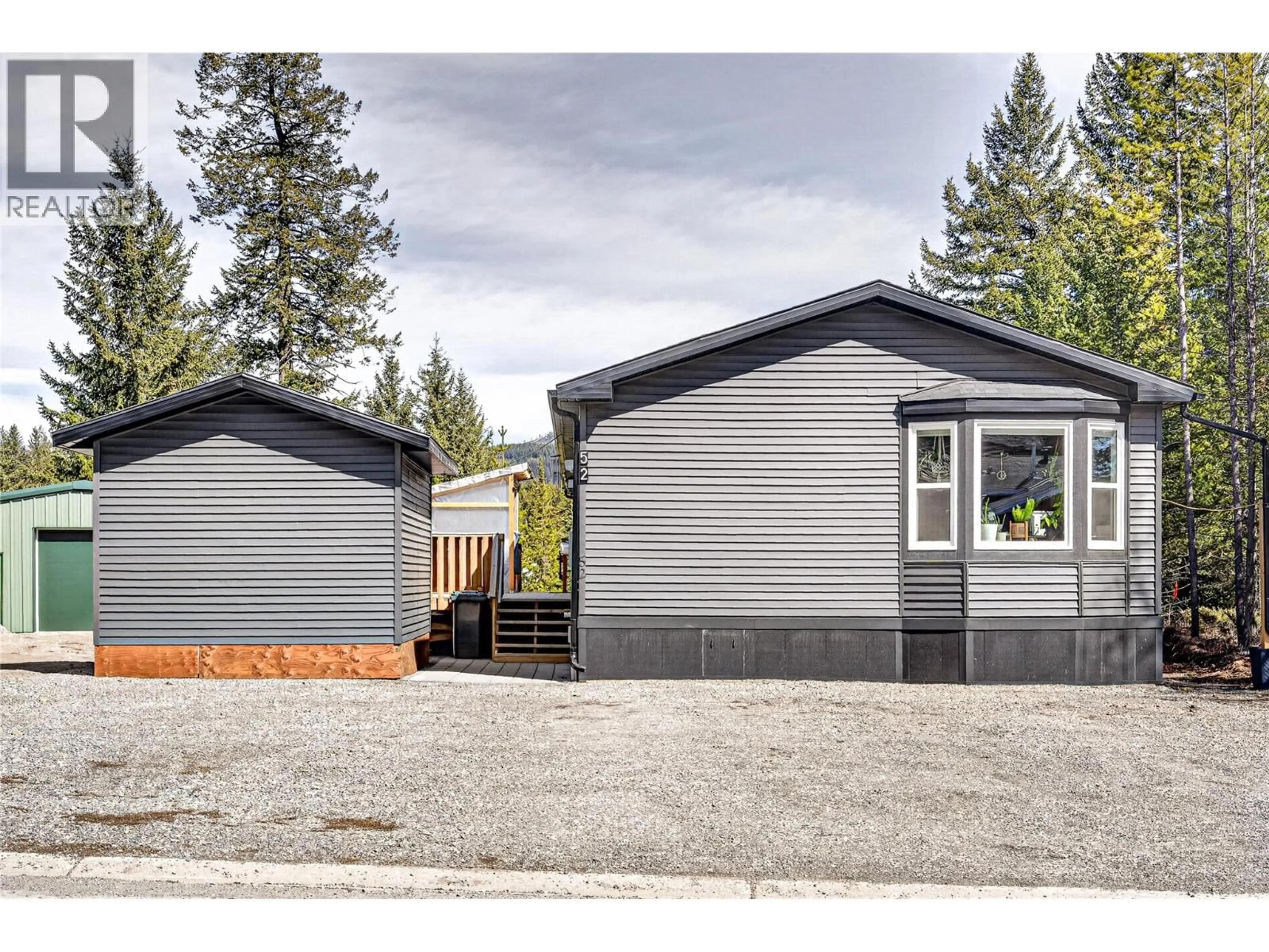 Home with vinyl exterior material, street for 52 DARBY CRESCENT, Elkford British Columbia V0B1H0