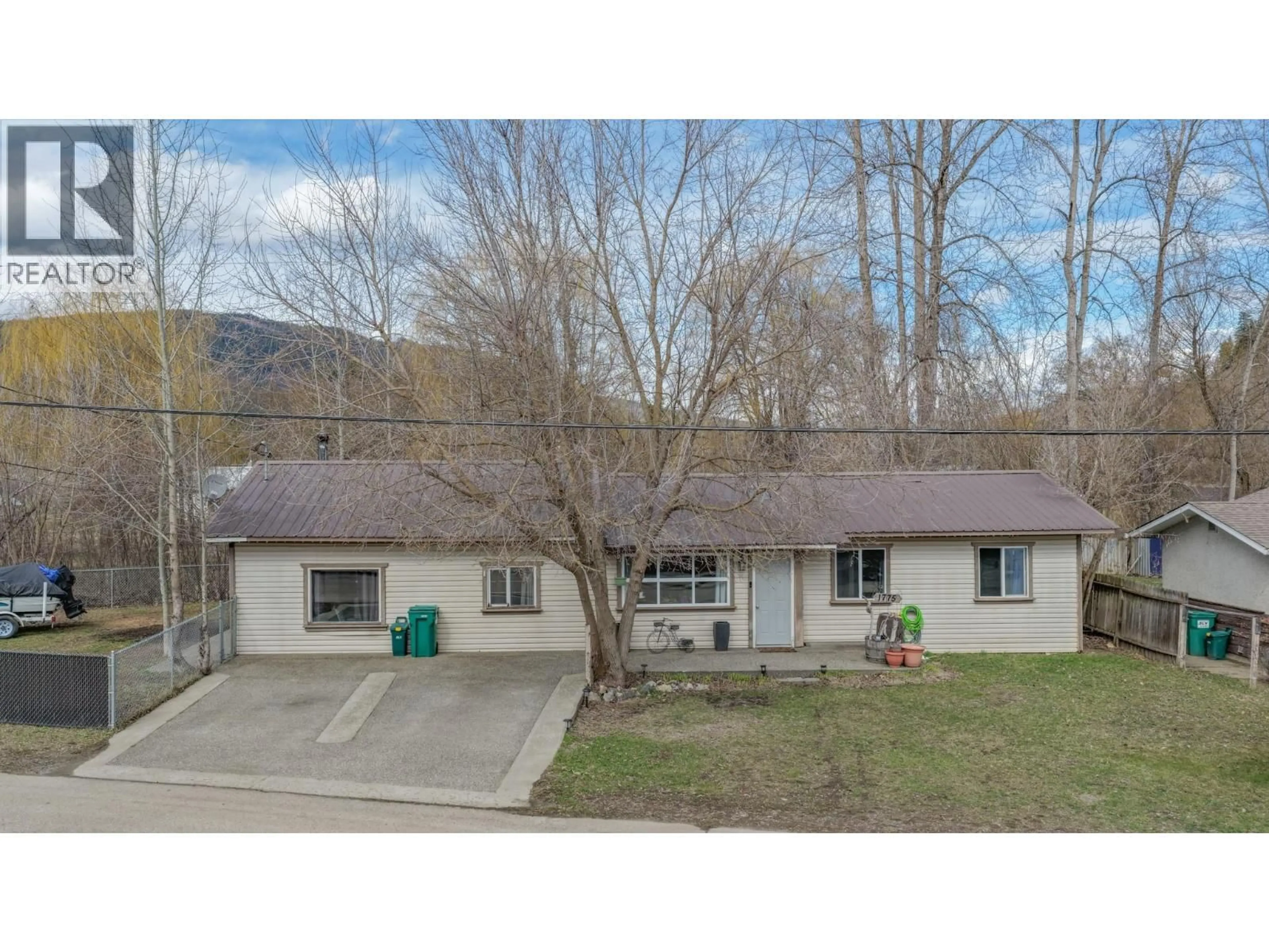 A pic from outside/outdoor area/front of a property/back of a property/a pic from drone, mountain view for 1775 MAPLE STREET, Lumby British Columbia V0E2G0