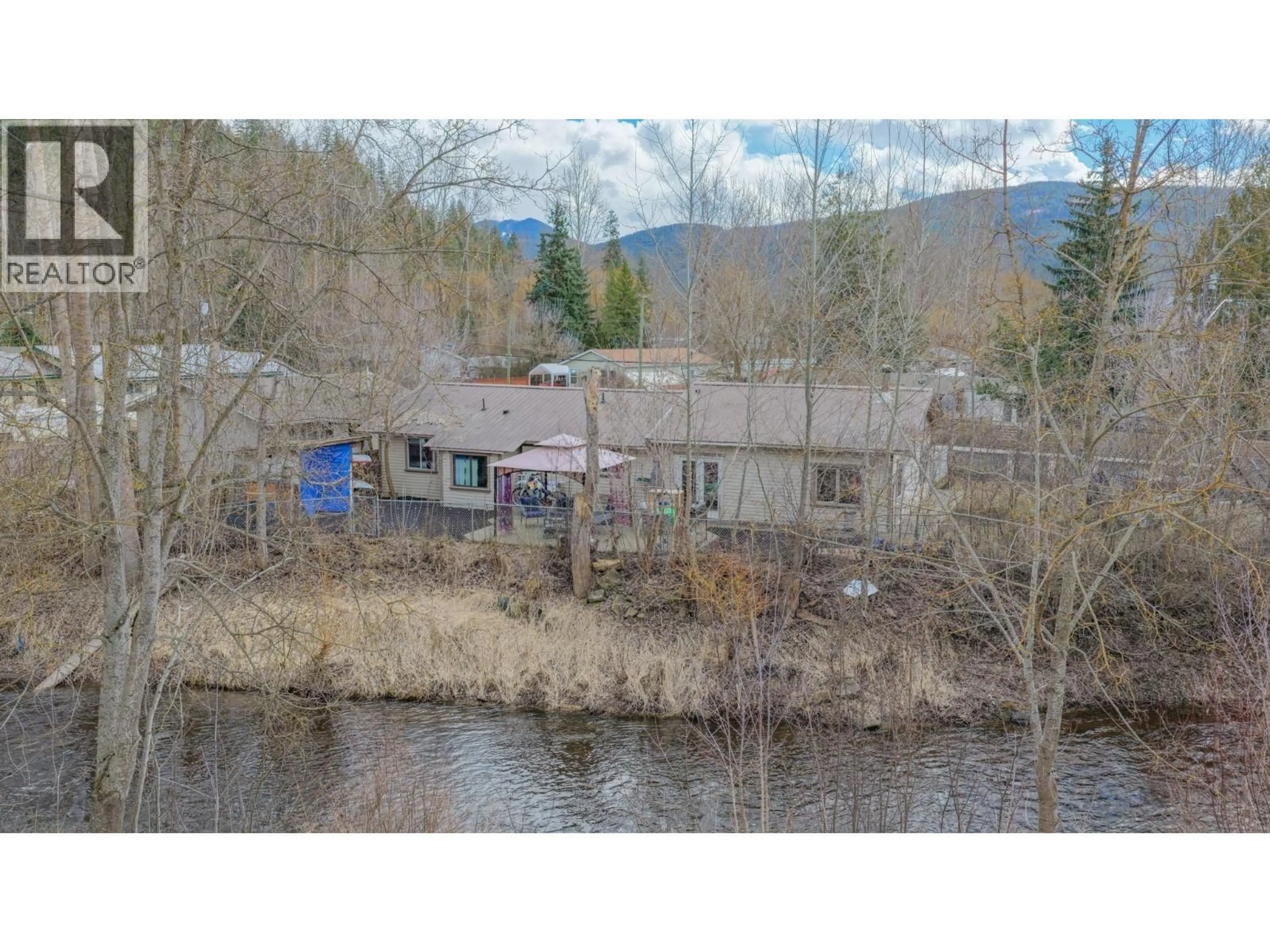 A pic from outside/outdoor area/front of a property/back of a property/a pic from drone, water/lake/river/ocean view for 1775 MAPLE STREET, Lumby British Columbia V0E2G0