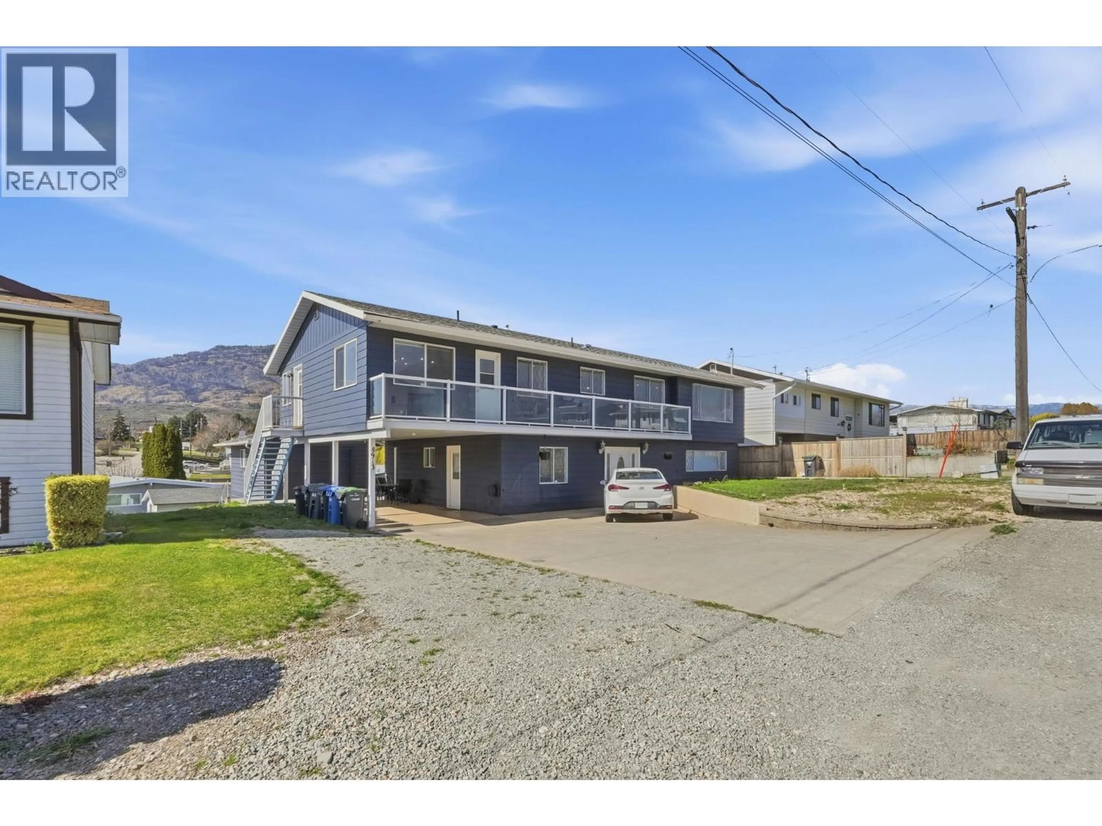A pic from outside/outdoor area/front of a property/back of a property/a pic from drone, mountain view for 8913 JUBILEE DRIVE, Osoyoos British Columbia V0H1V2