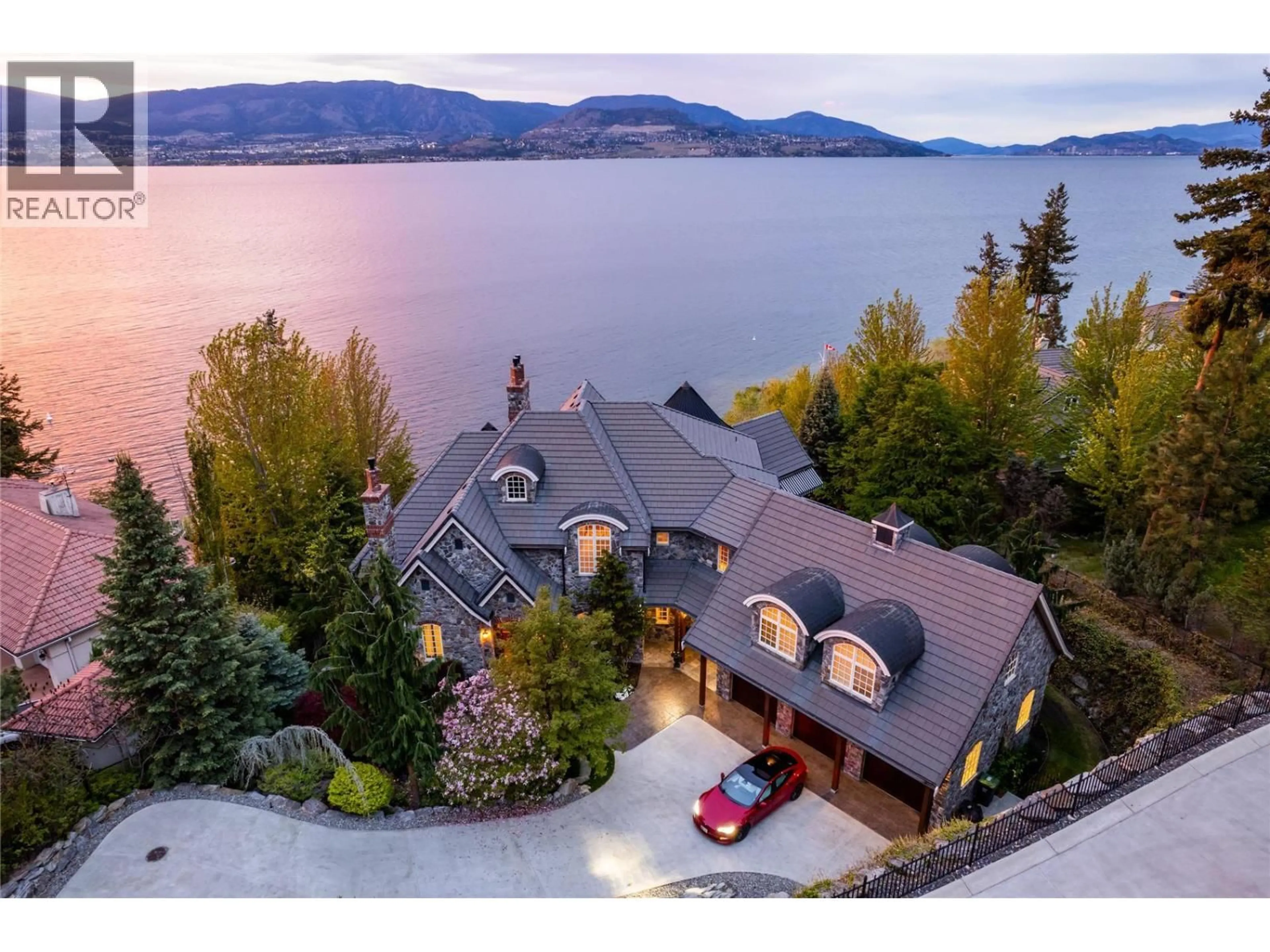 A pic from outside/outdoor area/front of a property/back of a property/a pic from drone, water/lake/river/ocean view for 225 SWICK ROAD, Kelowna British Columbia V1W4J5