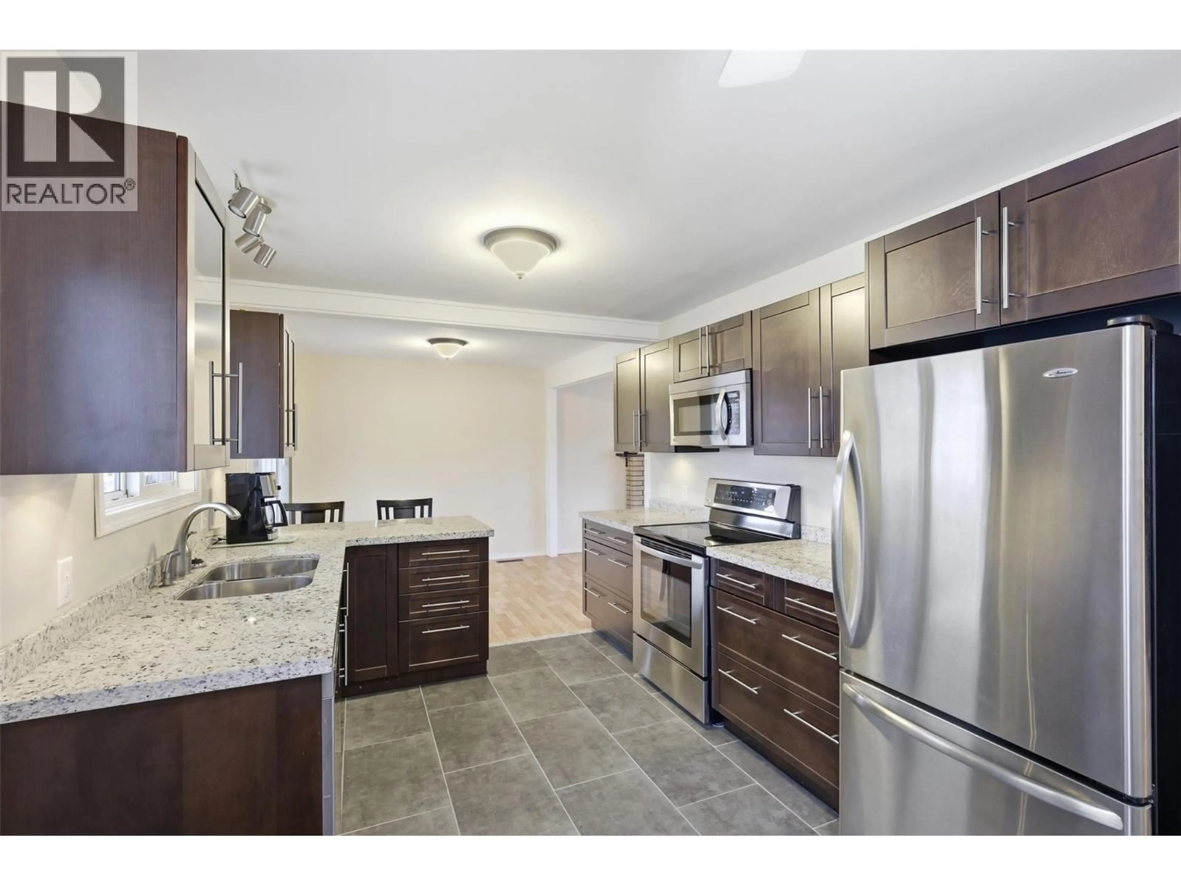 Standard kitchen, ceramic/tile floor for 1119 KEMANO STREET, Kamloops British Columbia V2B2T8