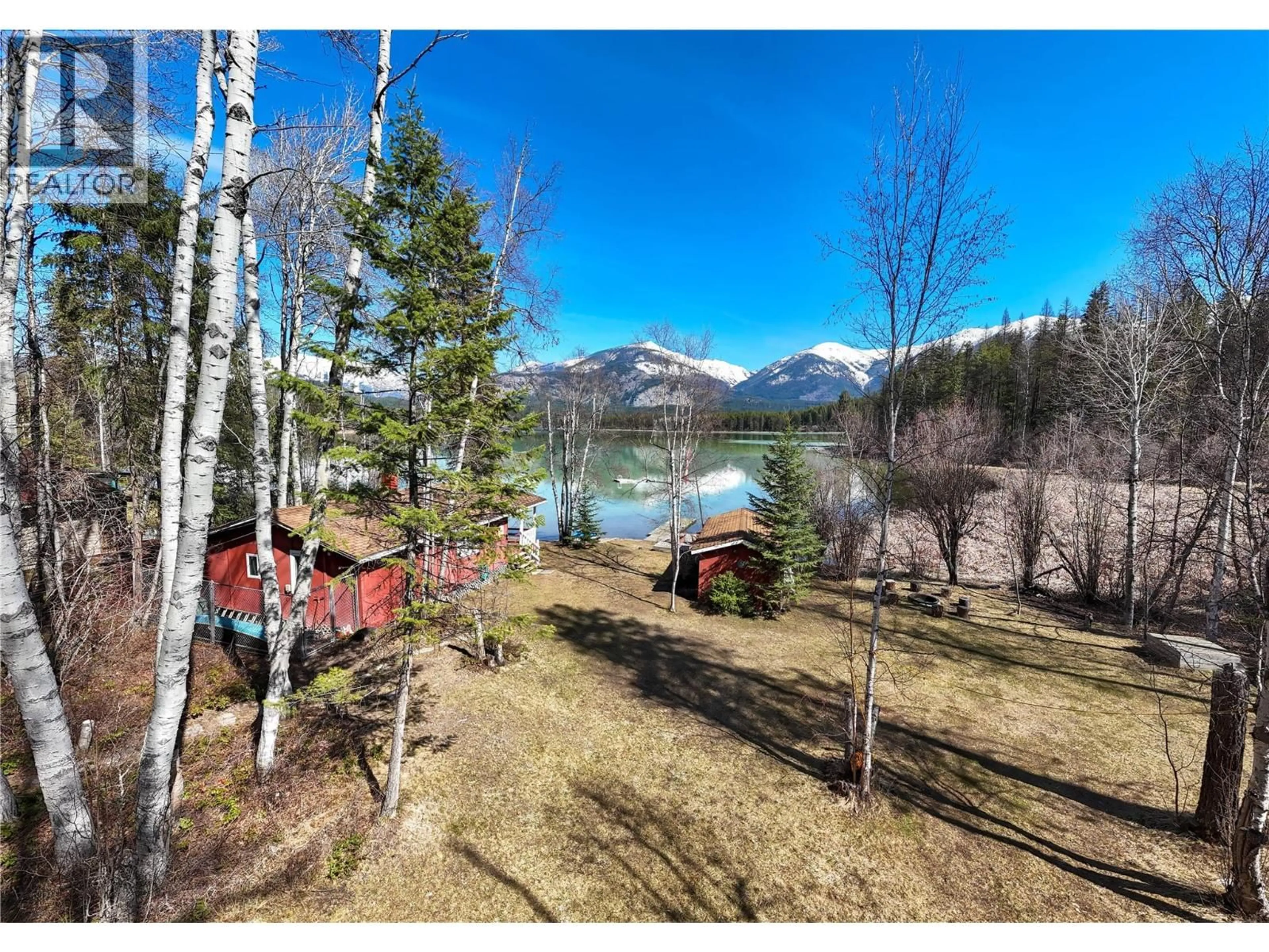 A pic from outside/outdoor area/front of a property/back of a property/a pic from drone, water/lake/river/ocean view for 1415 TIE LAKE SHORE S ROAD, Jaffray British Columbia V0B1T0