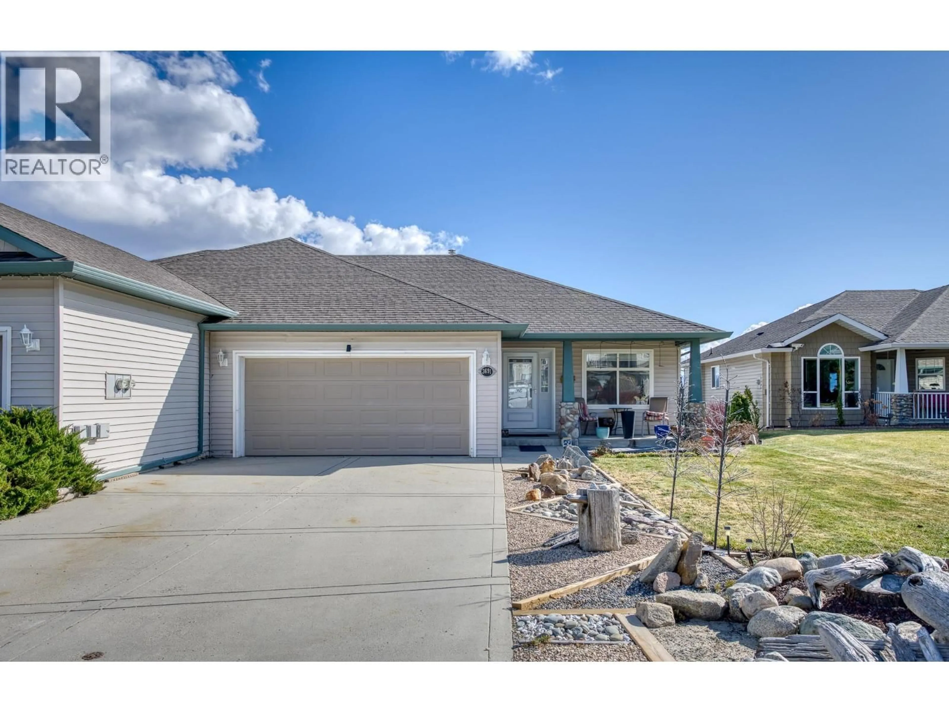 Home with vinyl exterior material, street for 3691 YORKTON ROAD, West Kelowna British Columbia V4T2T7