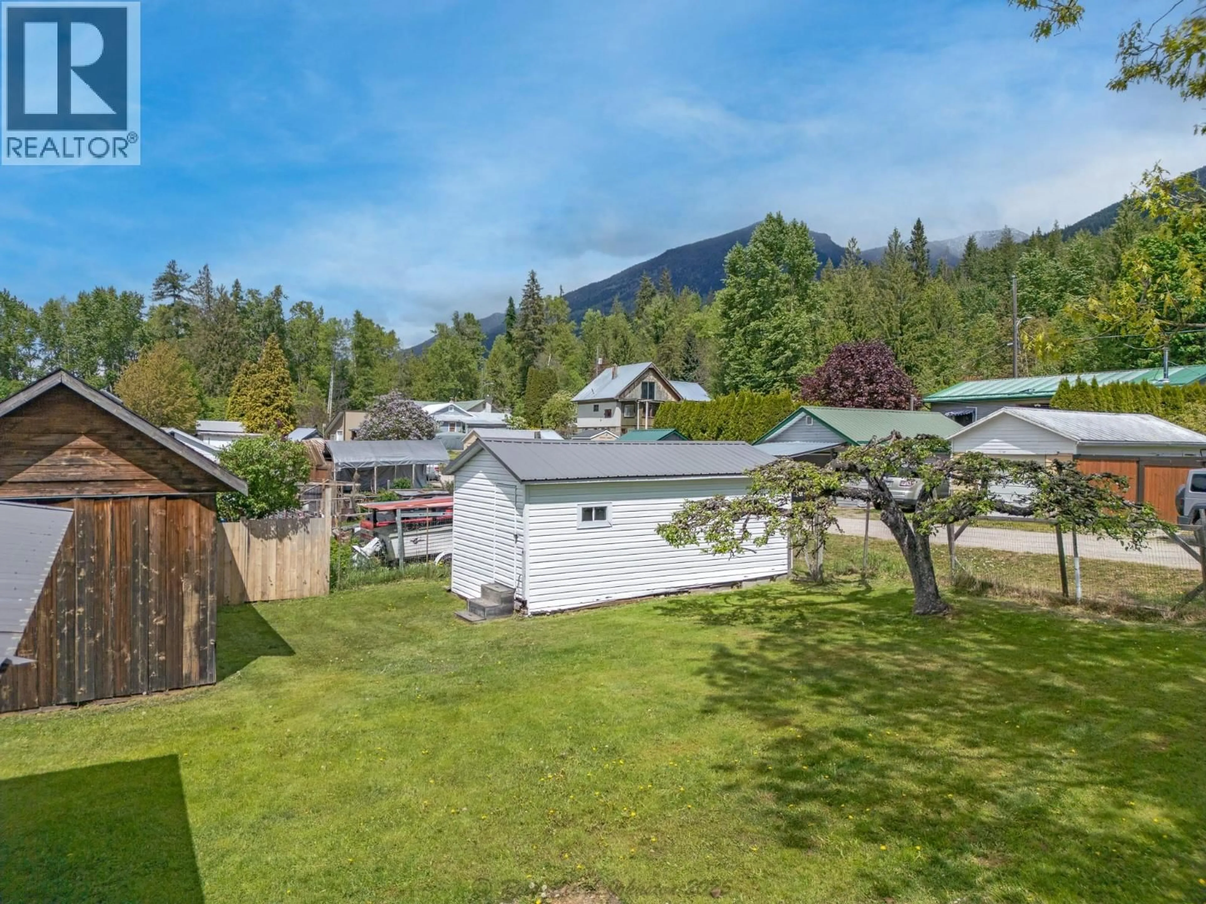 A pic from outside/outdoor area/front of a property/back of a property/a pic from drone, mountain view for 1610 EASTMAN AVENUE, Riondel British Columbia V0B2B0