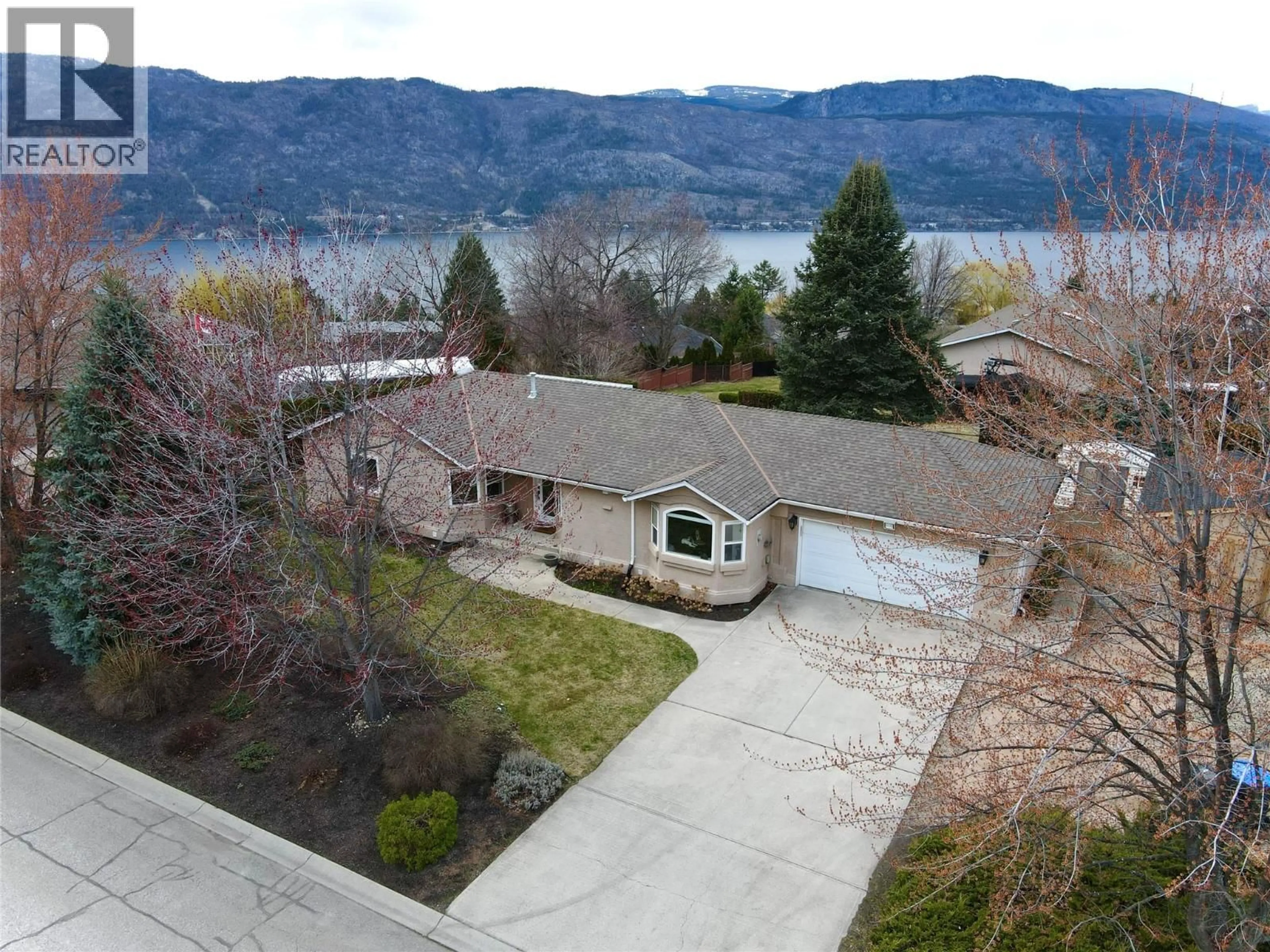 A pic from outside/outdoor area/front of a property/back of a property/a pic from drone, water/lake/river/ocean view for 1740 SALDIN COURT, Lake Country British Columbia V4V1N9