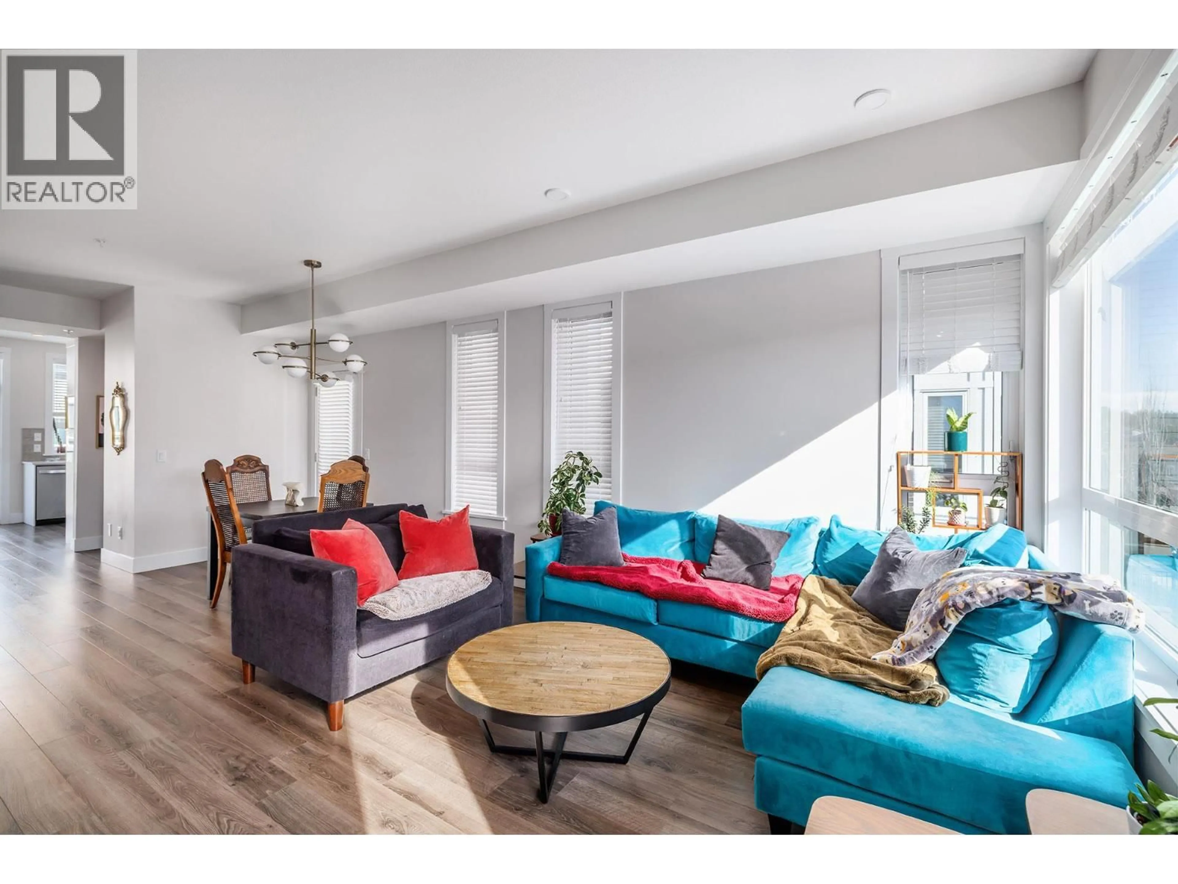 Living room with furniture, wood/laminate floor for 58 - 13098 SHORELINE WAY, Lake Country British Columbia V4V0A8